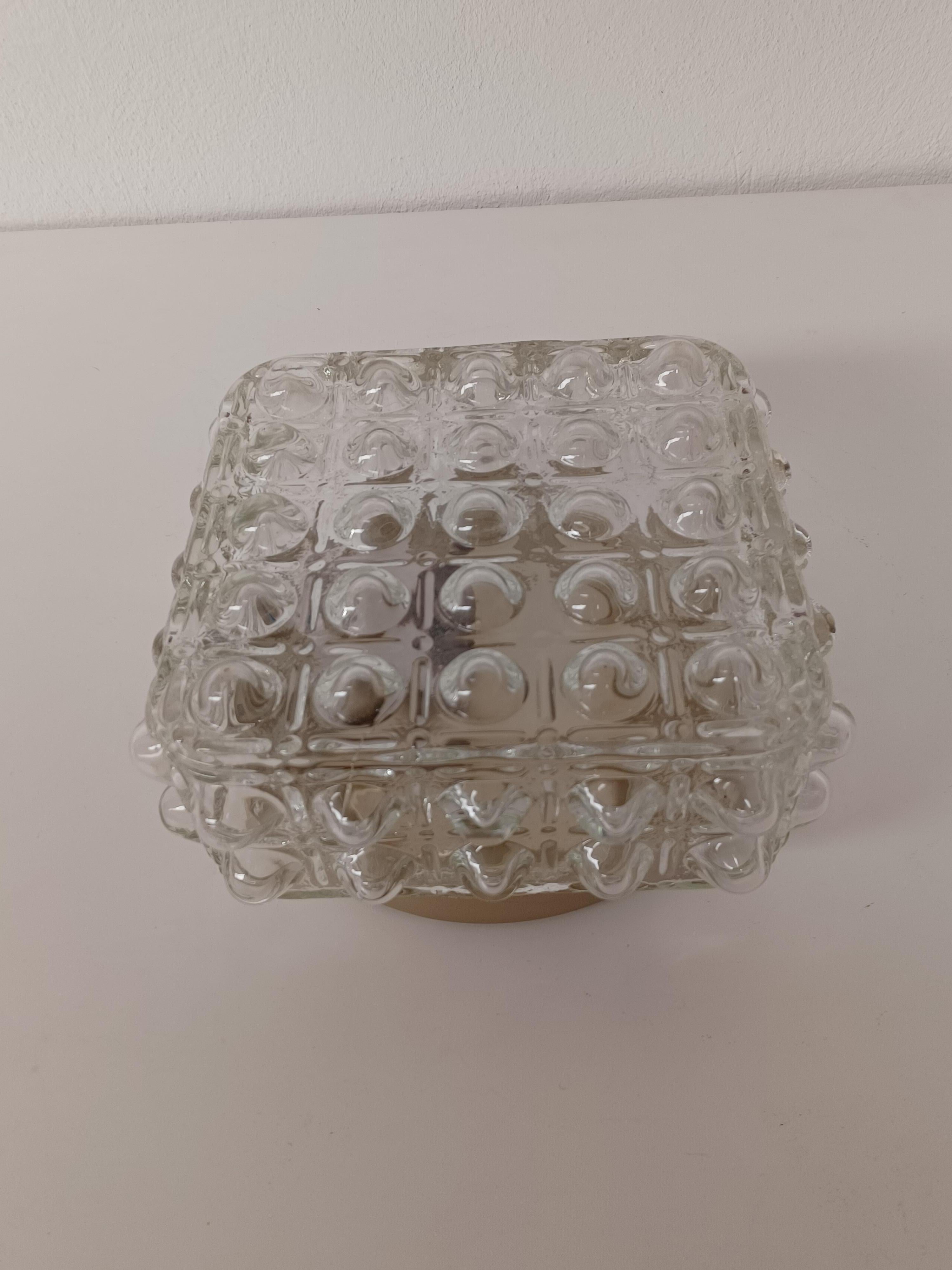 1970's Restored and rewired Danish flush mount in glass 

The flush mount was manufactored by E. Horn A/S in Aalestrup and feature a completely rewired 1 light fixture  with a large thick glass lampshade with a structured surface on the