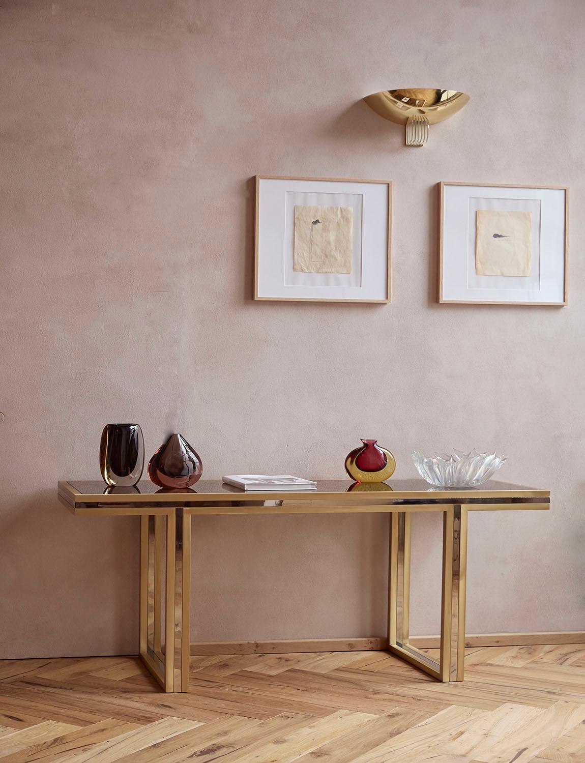 A fully restored Romeo Rega console table in brass and chrome. This table was found in Narni in a private home, together with a magnificent signed Rega table lamp. The table has been refinished in new brass, as the original brass was in poor