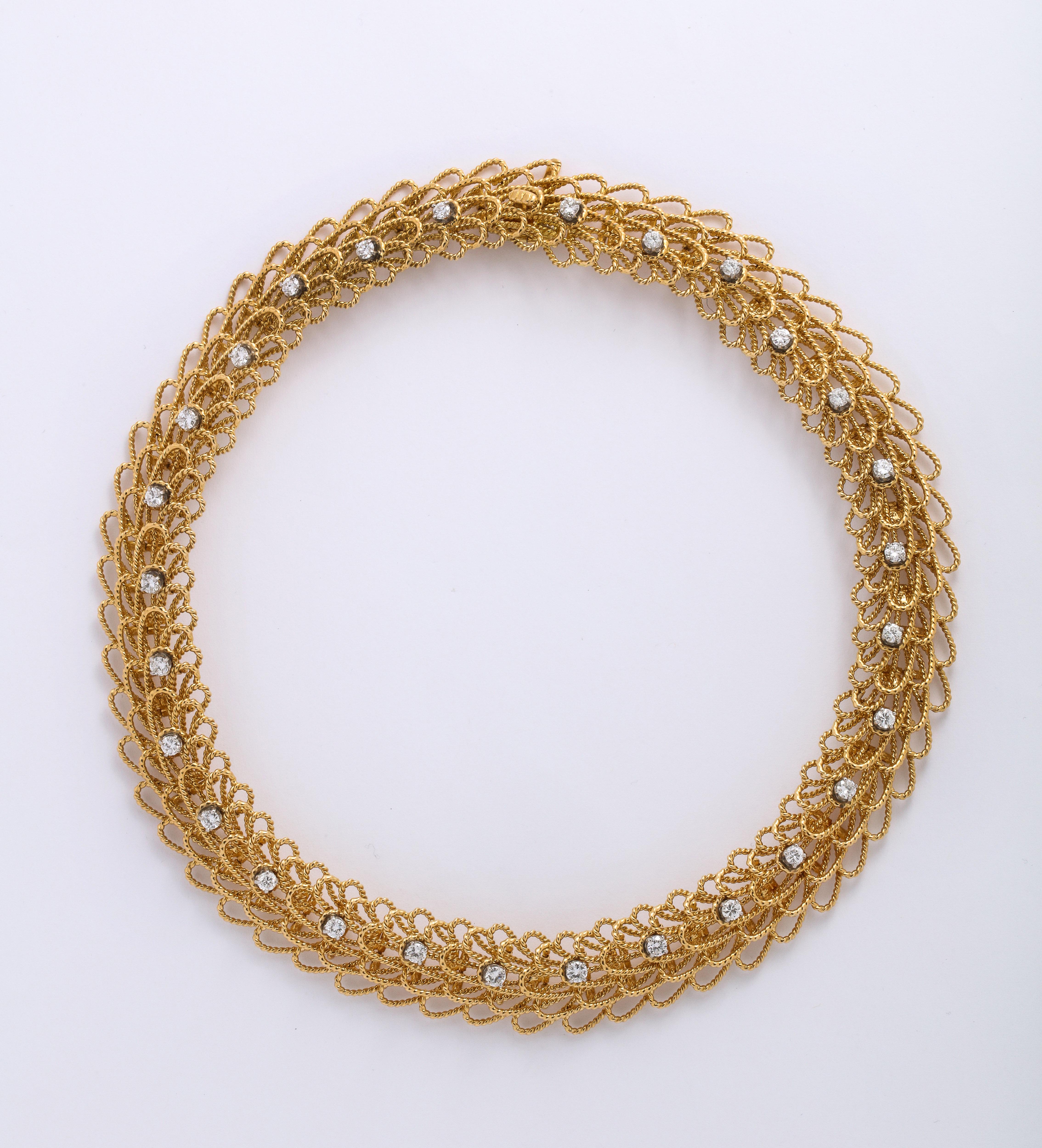 18k Gold 1970's Necklace with Earrings is a unique twisted Wire design, the necklace will sit beautifully on any neck due to its mobility. 

Necklace and Earring Set 16 Inches 
145 Grams total weight of 18k Gold
Necklace is 125 Grams w/ 28 diamonds
