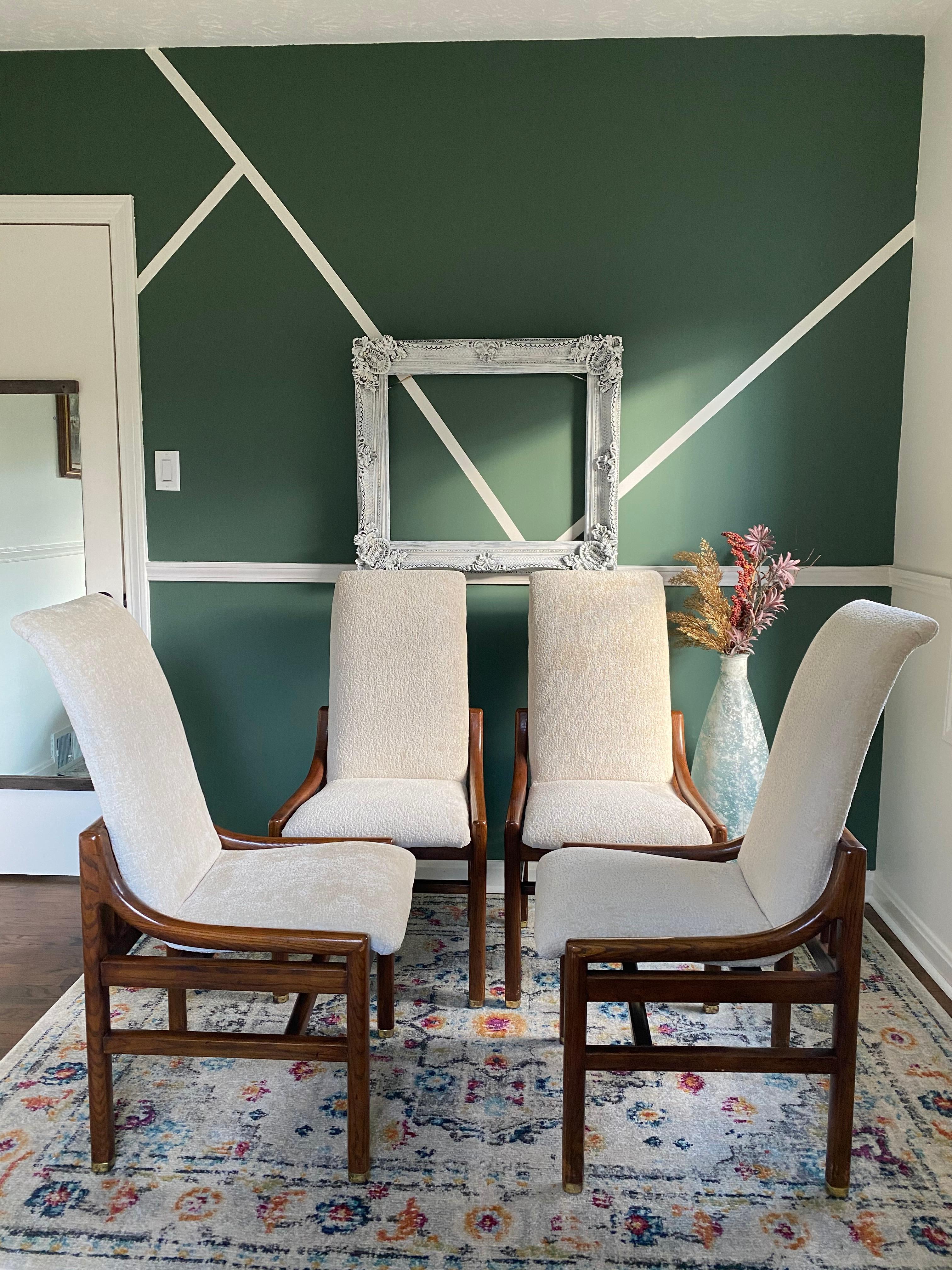 Mid-Century Modern sculptural dining chairs by Henredon. Chairs feature floating frames in their original condition, brass feet caps and newly reupholstered in a beautiful Crypton finished Chenille off-white fabric. They are well made, sturdy and