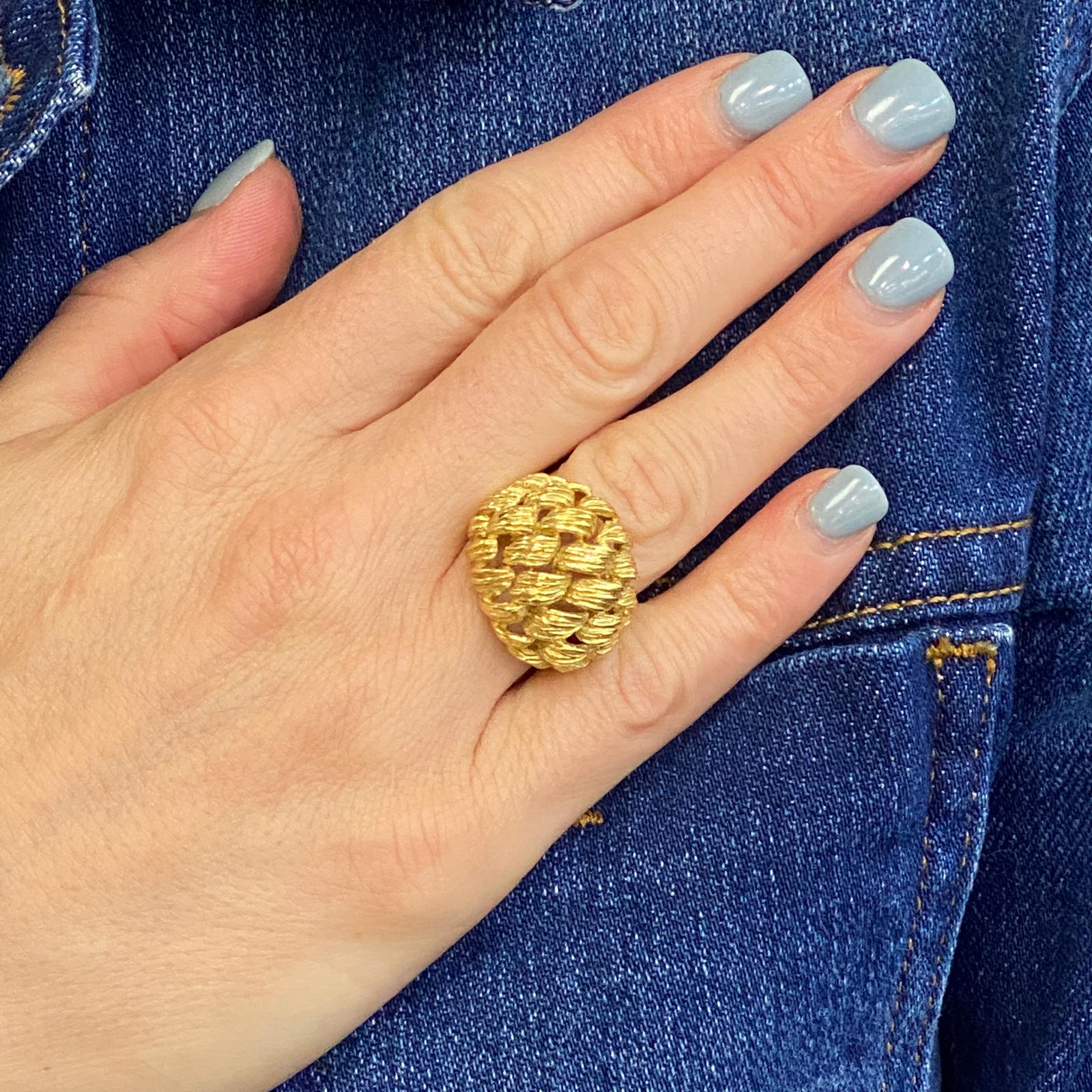 Beautiful dome ring fashioned in ribbed 18 karat yellow gold. The basket weave textured gold ring, circa 1970's.  measures 20mm in width and is currently size 5.5 (can be sized). 