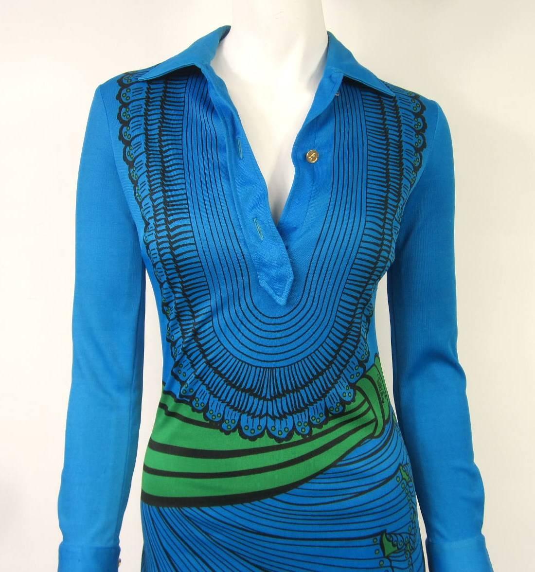 Graphic Electric Blue with a shot of vibrant green with black is stunning on this 1970s ROBERTA DI CAMERINO Maxi Dress. Collar with 3 button closure. Buttoned cuffs. Tag not present but buttons and Dress itself are hallmarked with an R. Stunning
