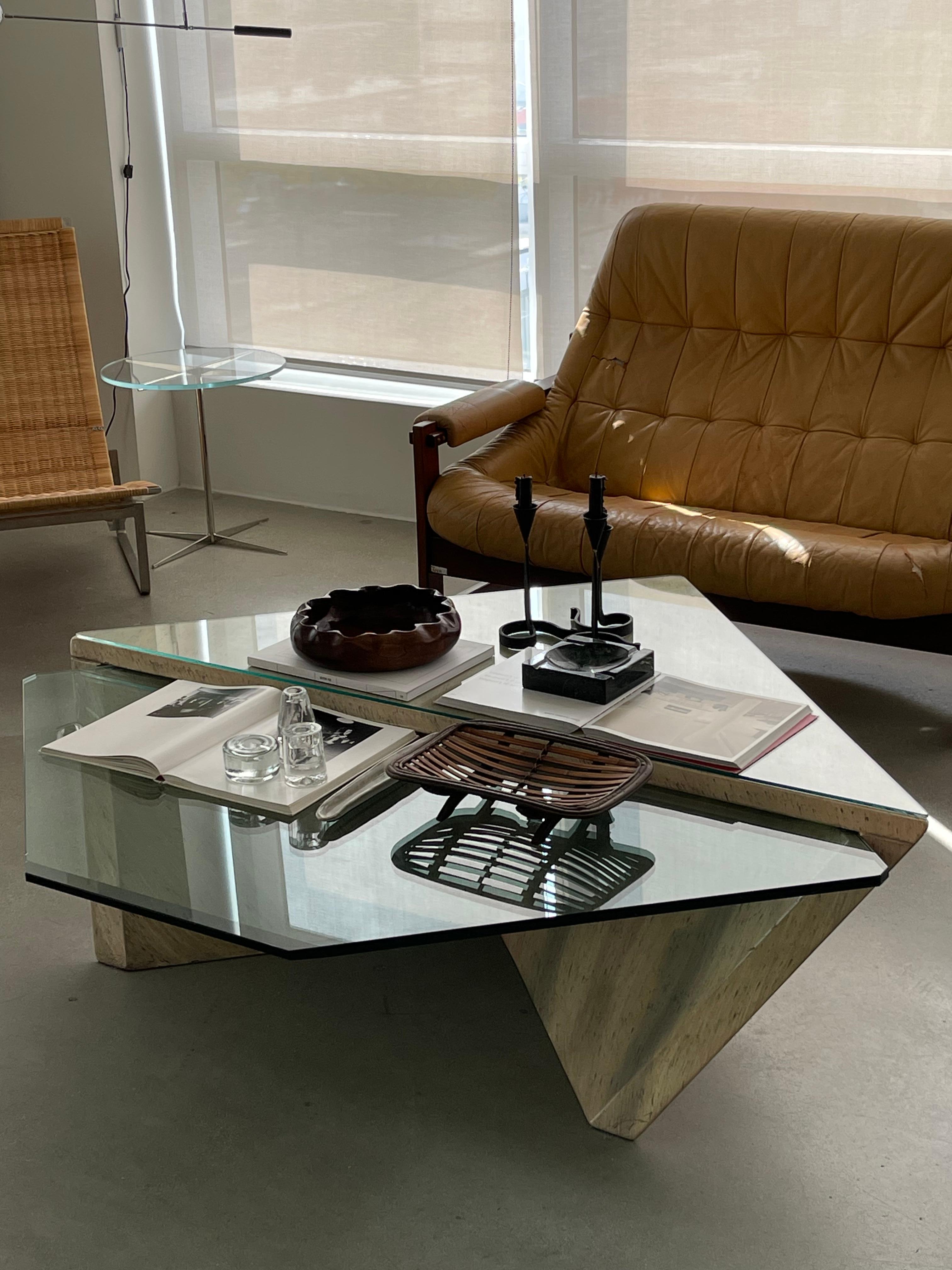 1970s Roger Rougier Post Modern Geometric Cantilever coffee table with a thick vintage glass insert, triangular glass top and a lacquered base. Total of 3 pieces that come together to create this unique floating glass design. Small chipped area of