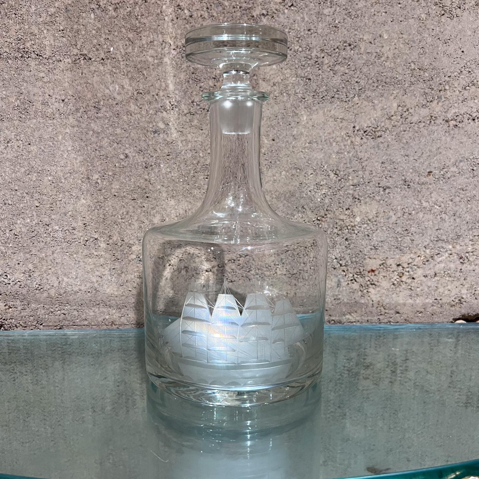 1970s Romania Etched Glass Decanter Clipper Sailboat
Tall 10.13 x 5.25 diameter
Clipper Sailboats Etched Glass 
Retains label made in Romania.
Original vintage condition like new.
Refer to images provided.