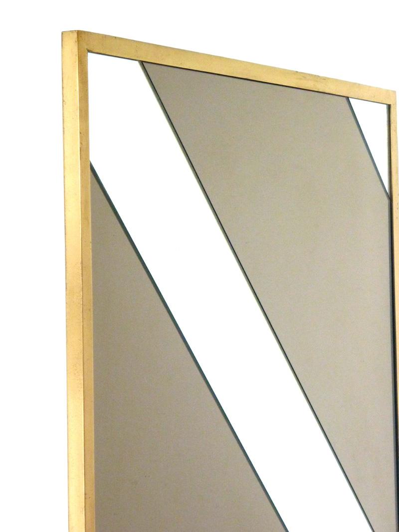 Wall Mirror
Romeo Rega
Italy, 1970

Brass framed
Smoked mirror bands

Very good condition