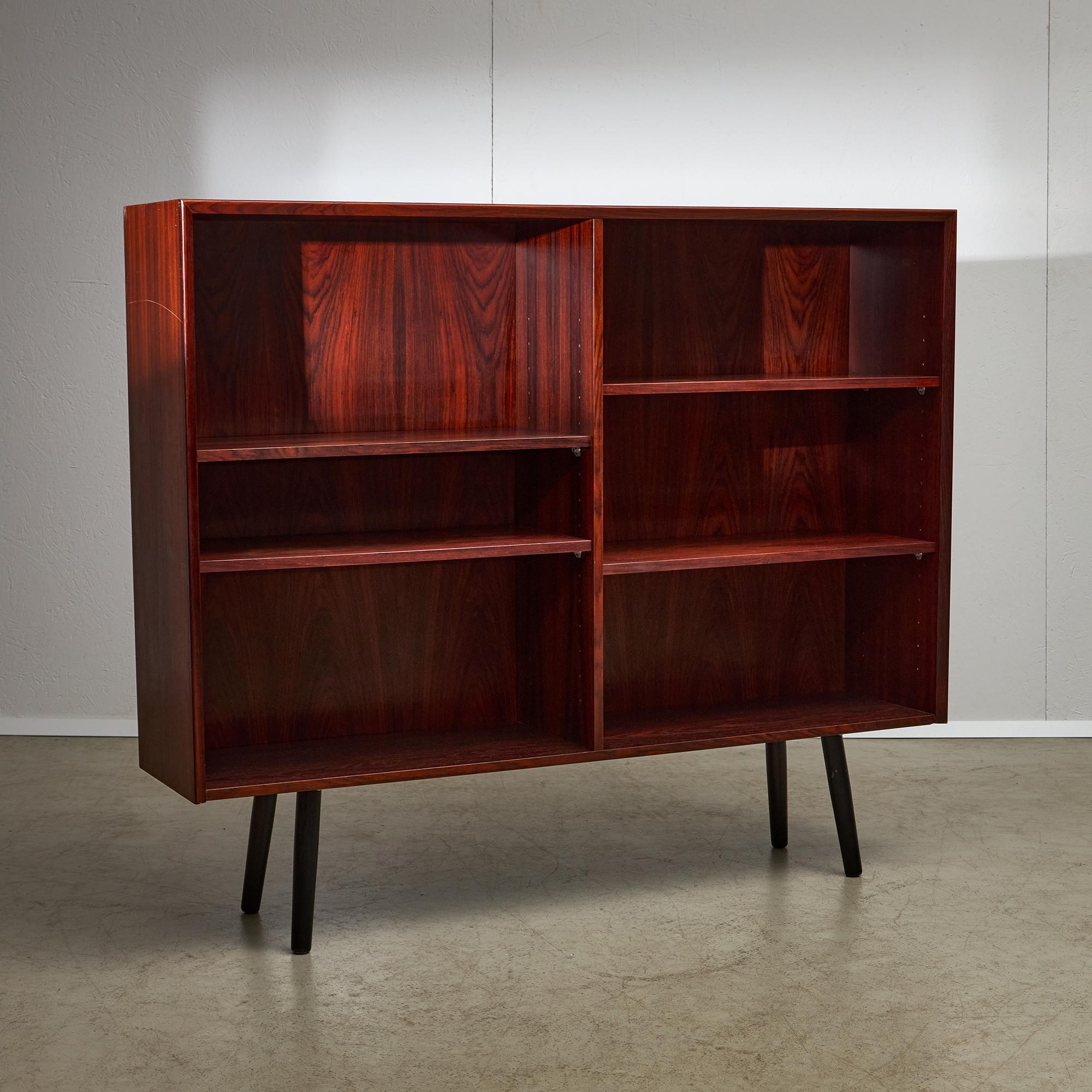 Introducing our stunning Rosewood Cabinet, a perfect blend of elegance and functionality. Crafted from premium rosewood, this cabinet showcases the wood's captivating deep brown to dark purple tones, enhanced by its unique grain patterns that add a