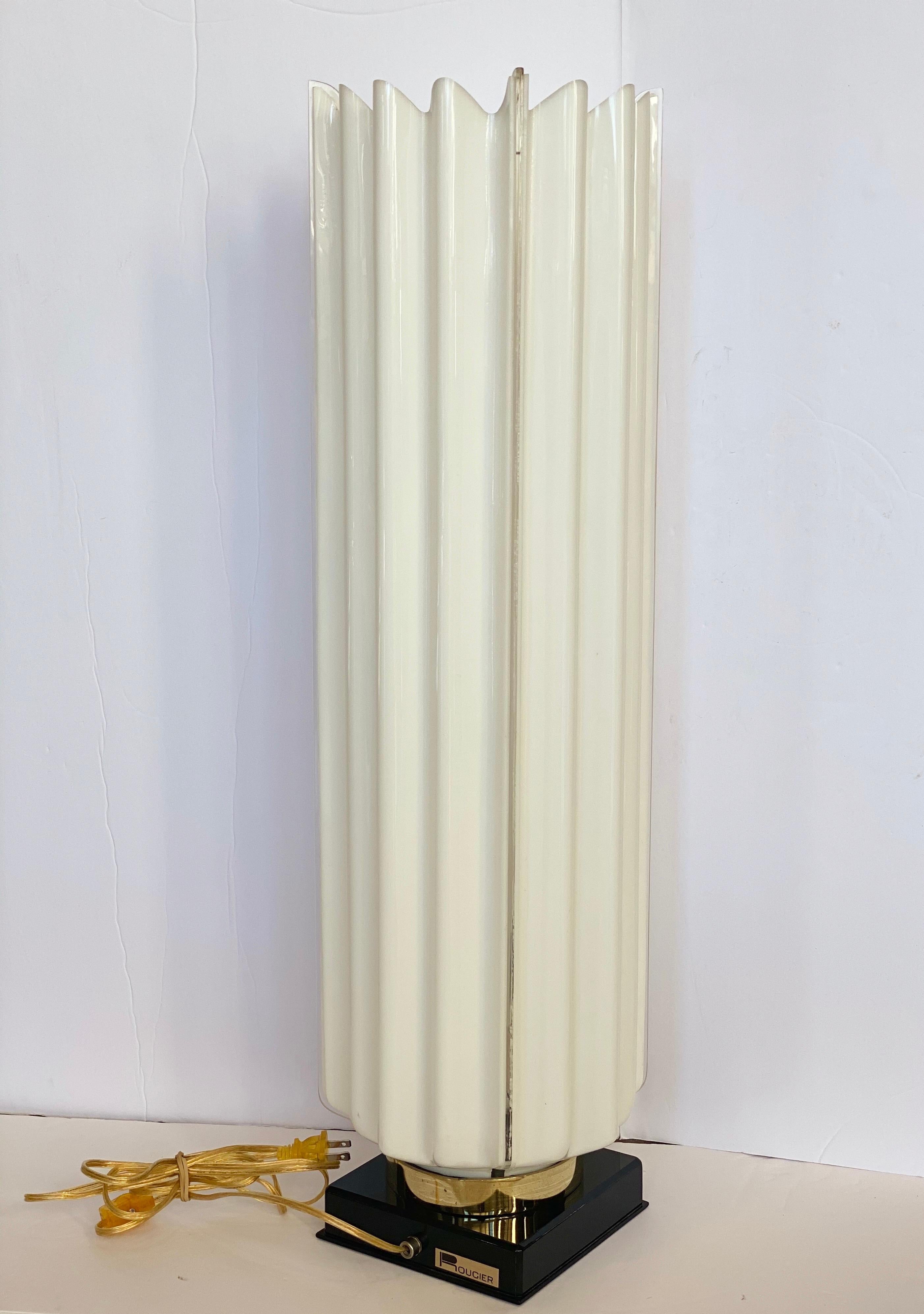 We are very pleased to offer a sculptural, modern table lamp by Rougier, circa the 1970s. A fluted white column sits on a square black acrylic base, a contrast in both shape and color that is sure to add visual interest to any space. In mint