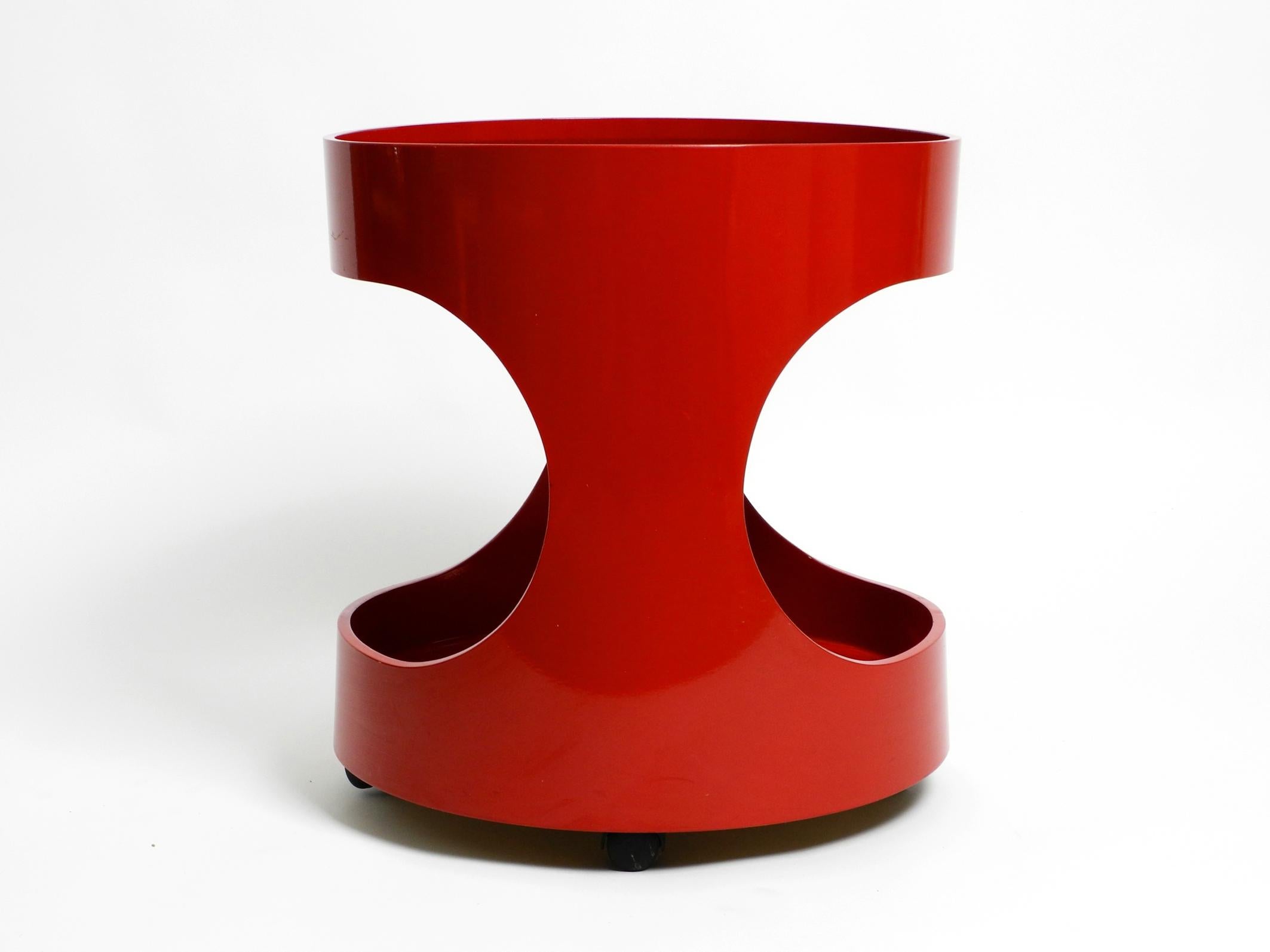 German 1970s round red side table from OPAL in Space Age design with smoked glass top For Sale