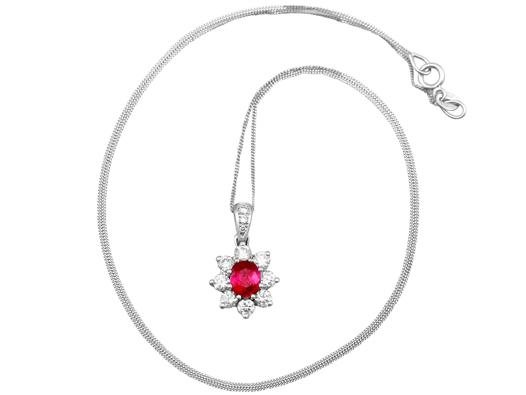 An impressive vintage 0.80 carat ruby and 0.58 carat diamond, 18 karat white gold pendant and chain; part of our diverse vintage jewelry and estate jewelry collections.

This fine and impressive vintage 1970s ruby and diamond pendant has been