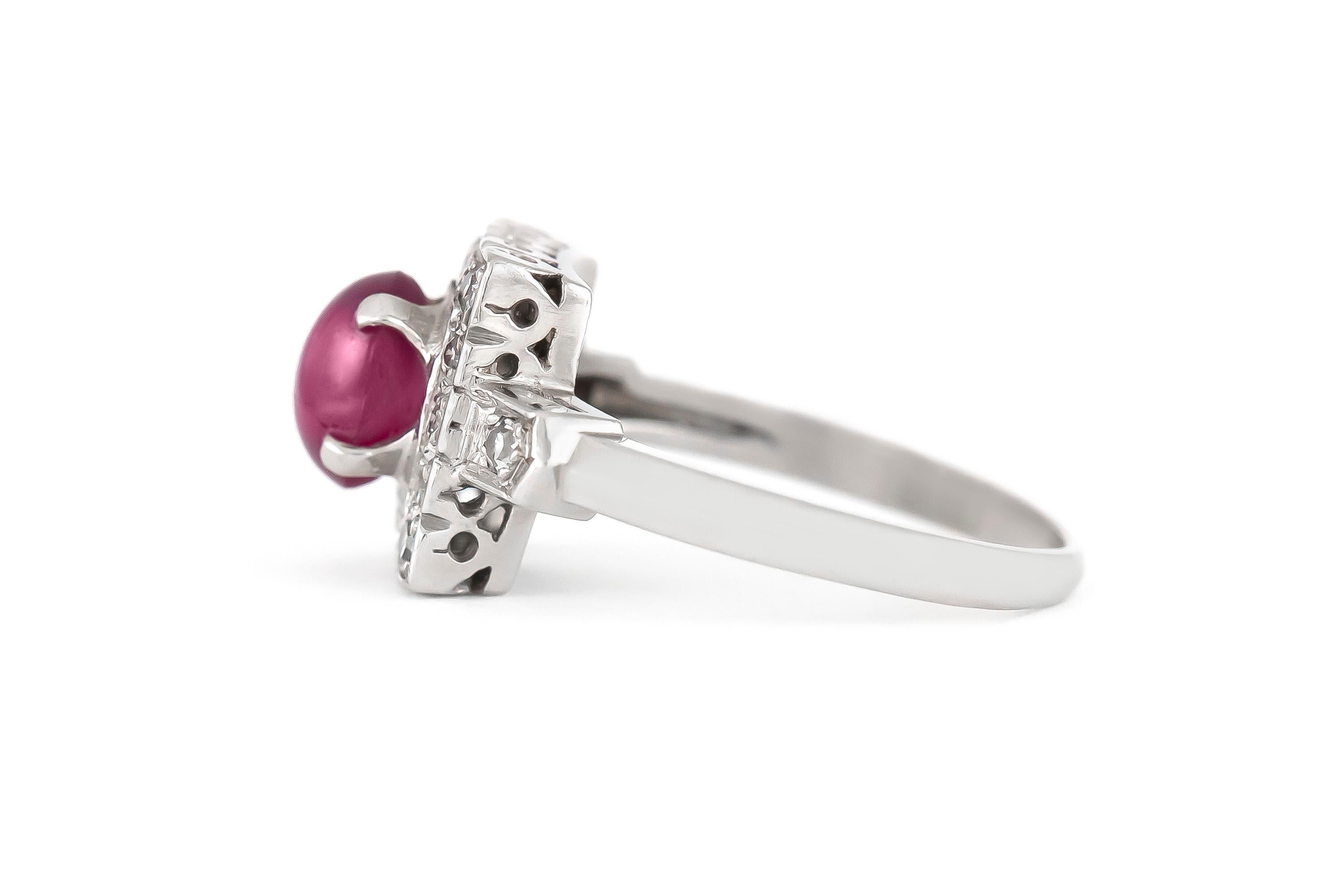 The ring is finely crafted in platinum with center stone ruby weighing approximately  total of 1.50 carat and diamonds weighing approximately total of 0.60 carat.
Circa 1970.
