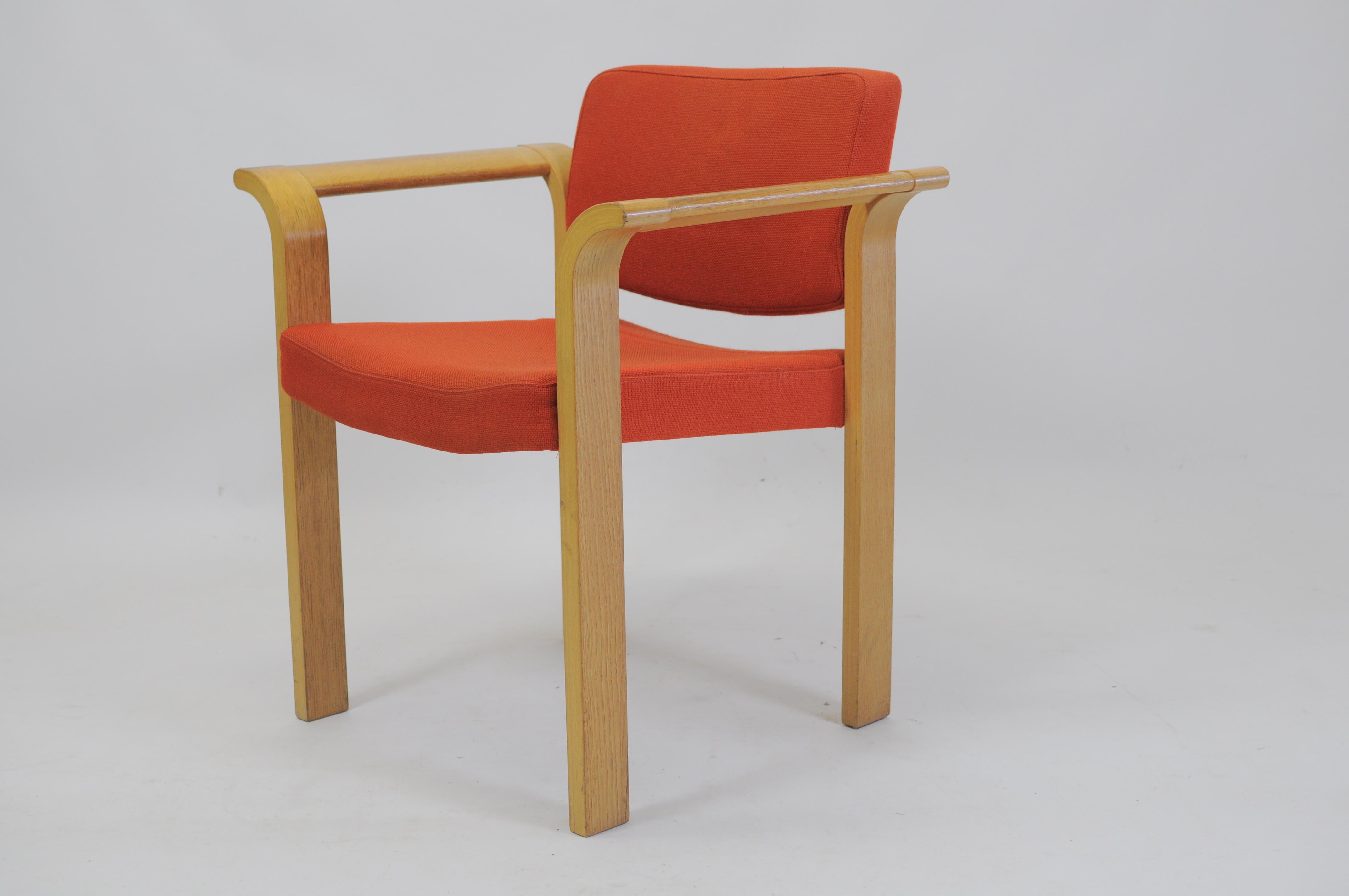 Set of six 61 series stackable laminated oak conference armchairs designed by Rud Thygesen and Johnny Sørensen for Magnus Olesen in 1975. 

The conference chairs are very comfortable in use and can be stacked six on top of each other making them