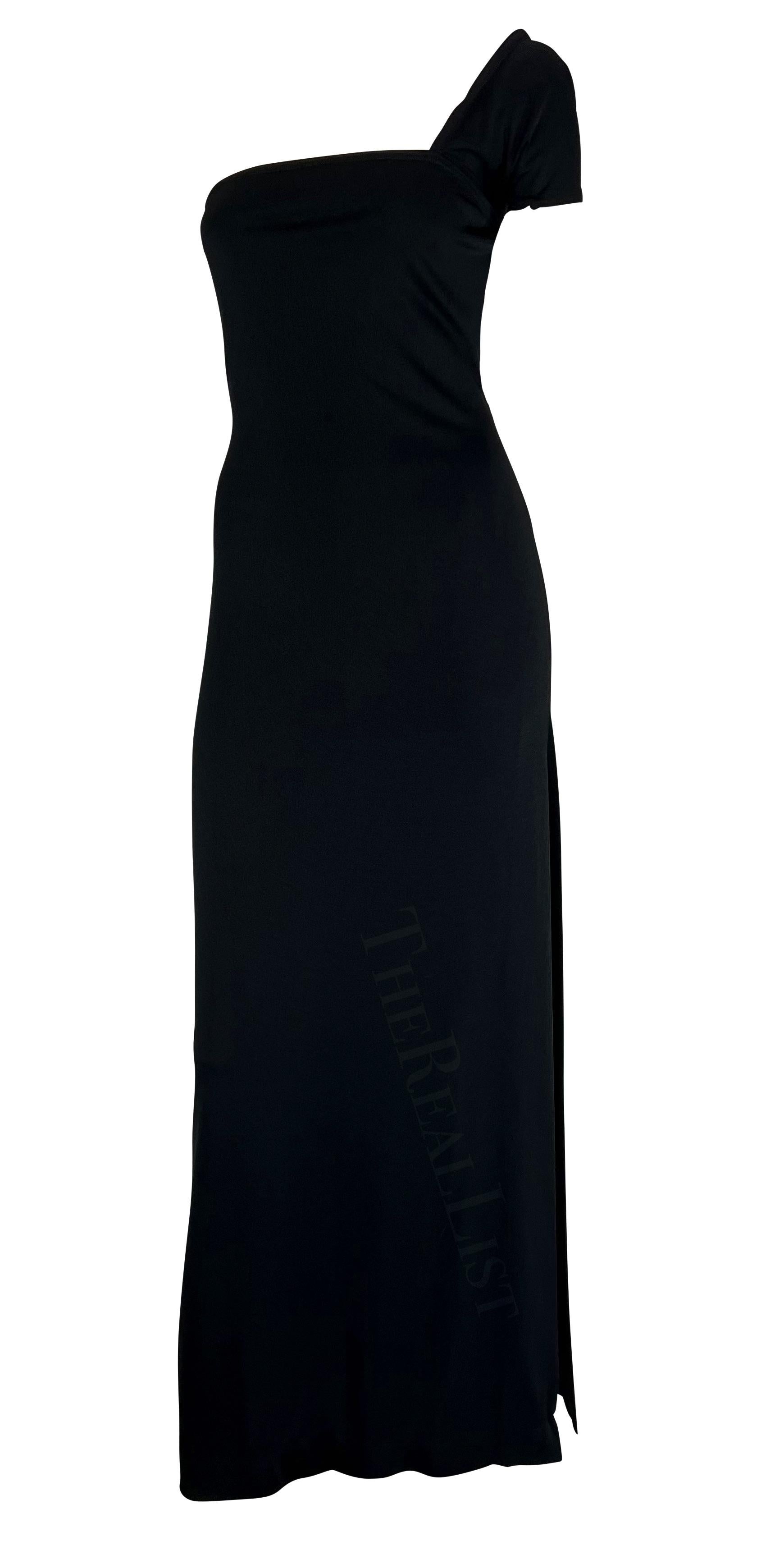 Sie präsentiert ein unglaubliches schwarzes Abendkleid von Rudi Gernreich für Bob Cunningham. Dieses schicke Kleid im Säulenstil aus den 1970er Jahren hat einen einzelnen schulterfreien Träger, einen eckigen Ausschnitt und einen hohen Schlitz an