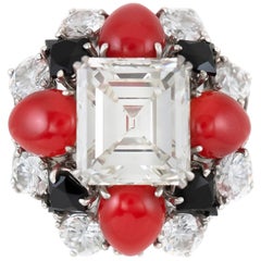 1970s Ruser Ring with Center GIA Emerald Cut Diamond, Coral and Onyx