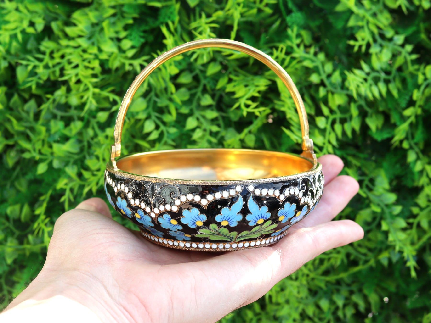 An exceptional, fine and impressive vintage Russian silver and polychrome cloisonné enamel sugar basket; an addition to our diverse silver teaware collection

This exceptional vintage Russian silver sugar basket has a plain circular form.

The