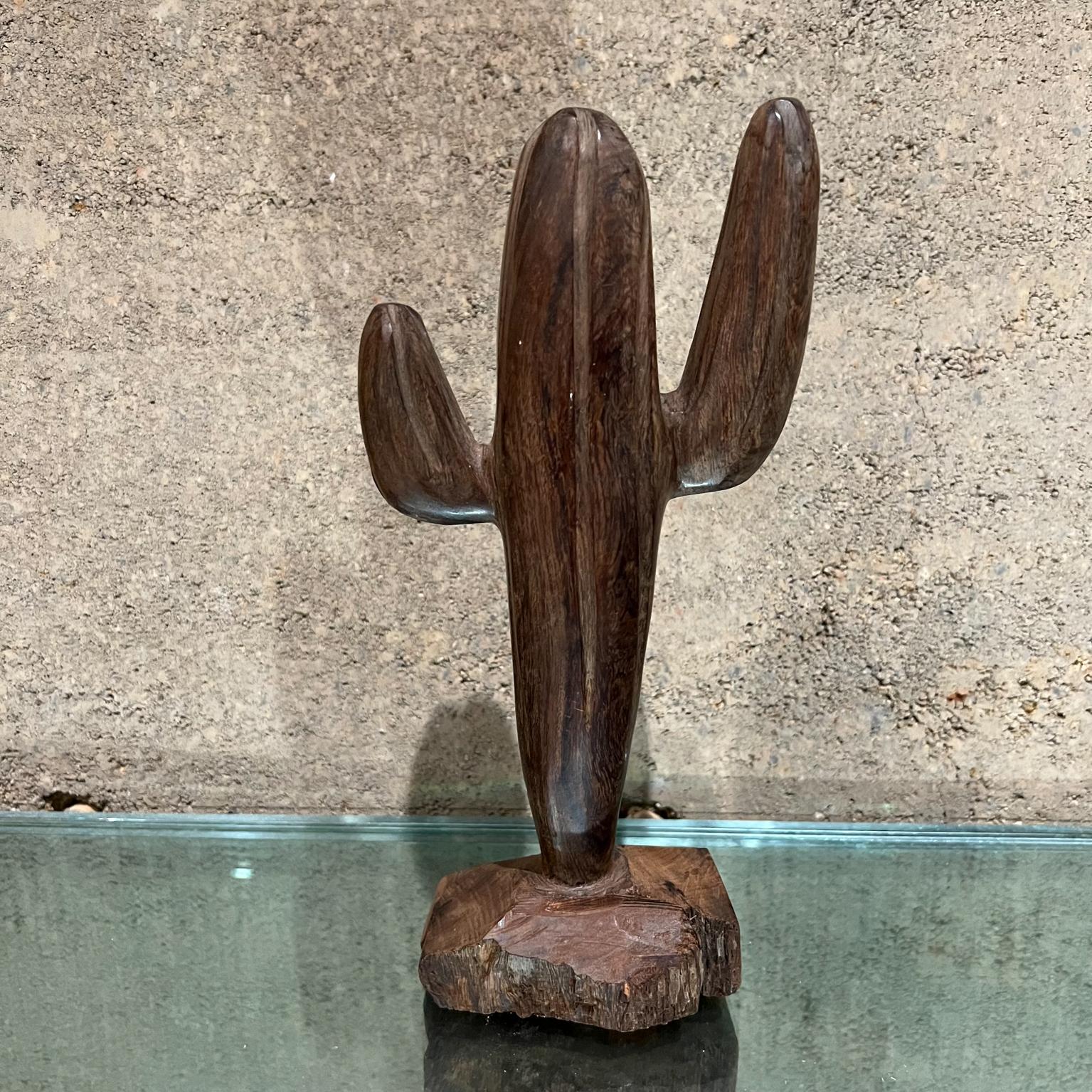 1970s Modern Saguaro Cactus Tree Small Carved Wood Sculpture.
Hand carved wood appears as palo fierro or cocobolo wood from Mexico.
11 tall x 5.5 w x 3 d
No signature present.
Preowned original vintage condition.
See images present.



