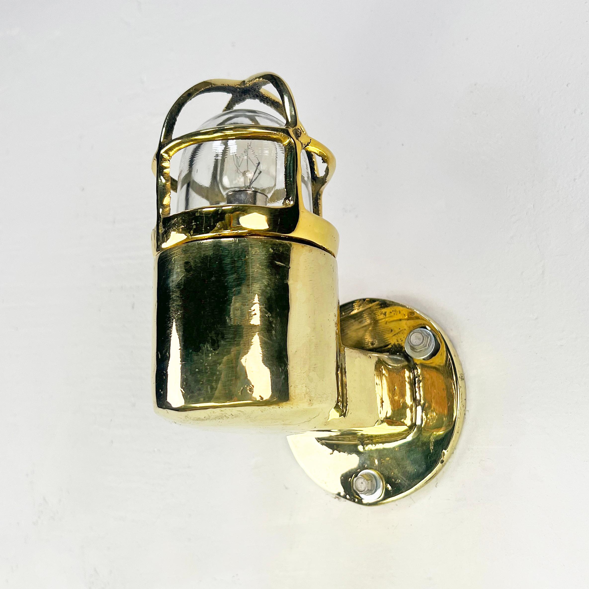 German 1970's Sall Cast Solid Brass 90 Degree Wall Light with Cage and Glass Dome For Sale