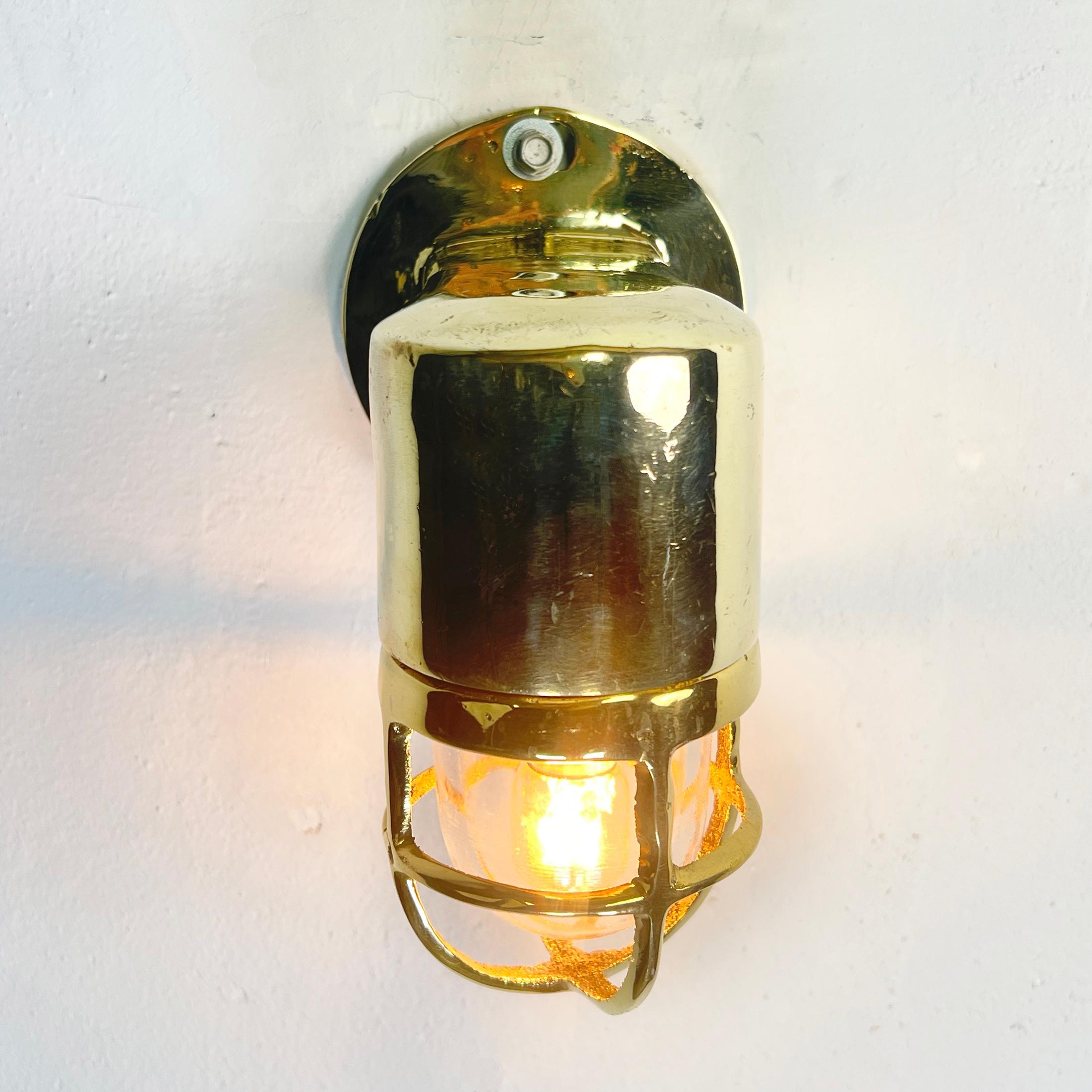 Late 20th Century 1970's Sall Cast Solid Brass 90 Degree Wall Light with Cage and Glass Dome For Sale