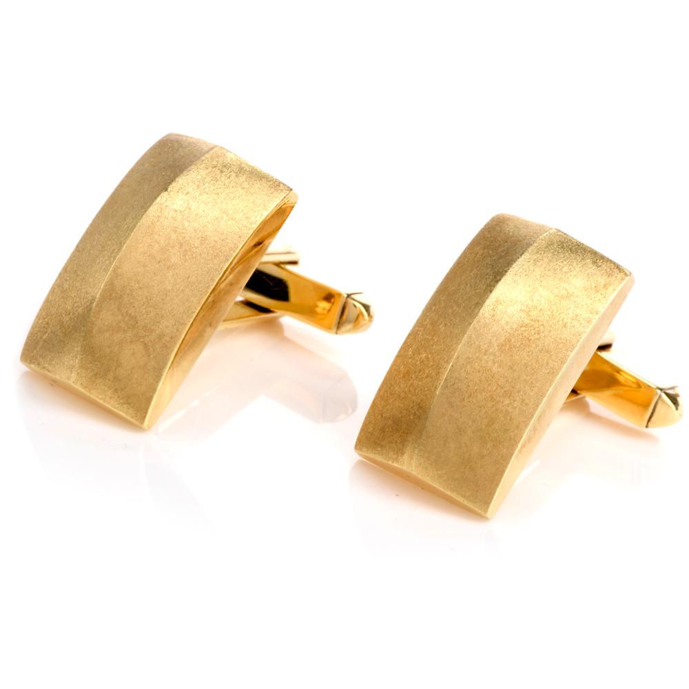 These bold yet simple Vinatge cufflinksCirca late 1970'S are crafted in 14-karat yellow gold, weighing 17.5 grams and measuring 21mm x 12mm. Designed as rectangle pyramid shapes embellished with a satin finish. Stamped with purity mark and remaining