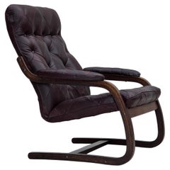 1970s, Scandinavian armchair, brown furniture leather, bent wood.
