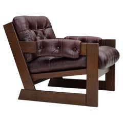 Vintage 1970s, Scandinavian armchair, brown furniture leather, dark beech wood.