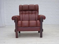 1970, fauteuil Wood Wood, meuble en cuir, bois de hêtre foncé.