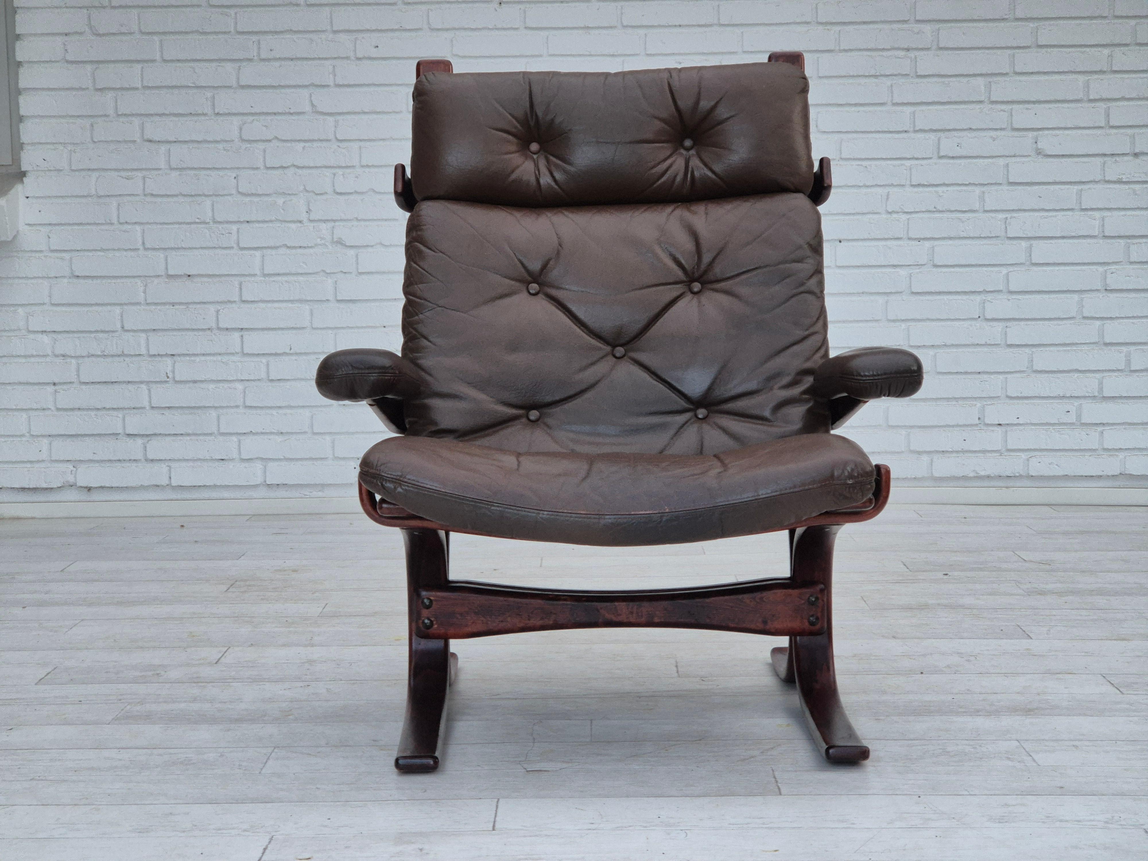 Scandinavian Modern 1970s, Scandinavian armchair, original condition, furniture leather, bent wood. For Sale