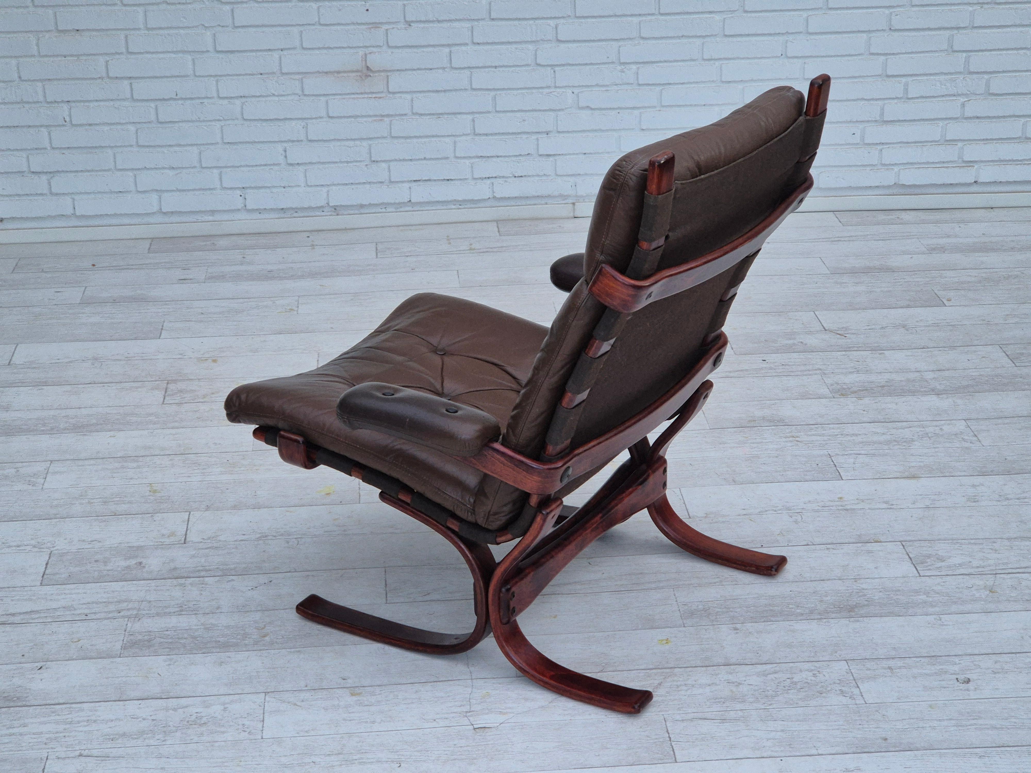 Late 20th Century 1970s, Scandinavian armchair, original condition, furniture leather, bent wood. For Sale