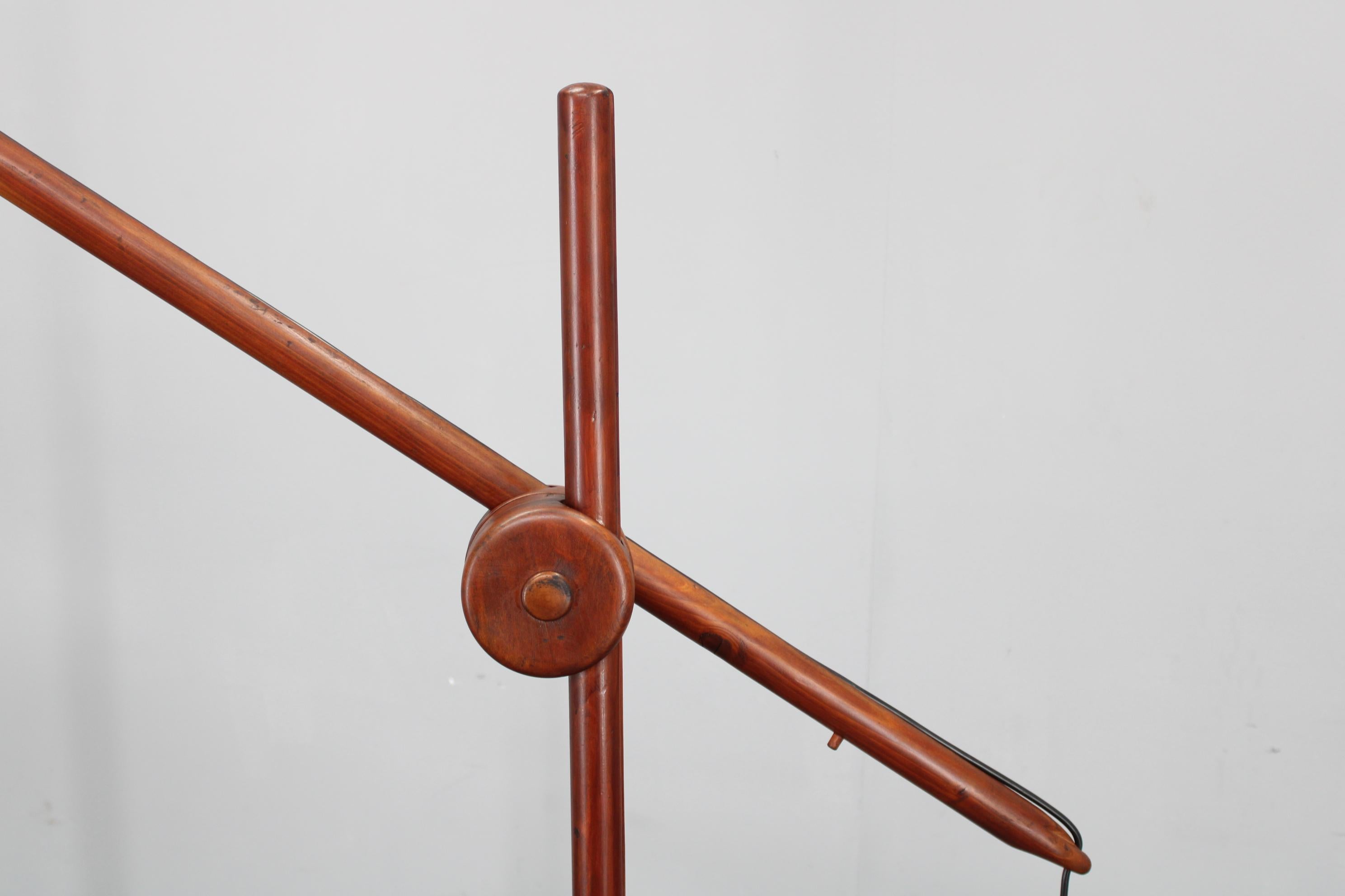 Striking Scandinavian mid-century counterbalance floor lamp made in the 1970s, featuring a pine tree frame, authentic period counterweight design, and a newly replaced paper shade. The lamp is partly refurbished and newly rewired for safety,