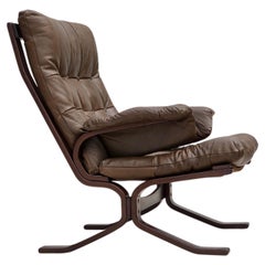 1970s, Scandinavian design, armchair in brown furniture leather.