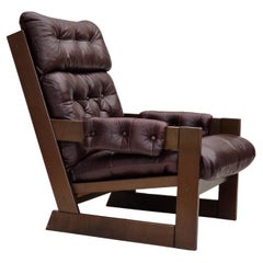 Vintage 1970s, Scandinavian highback armchair, brown furniture leather, dark beech wood.