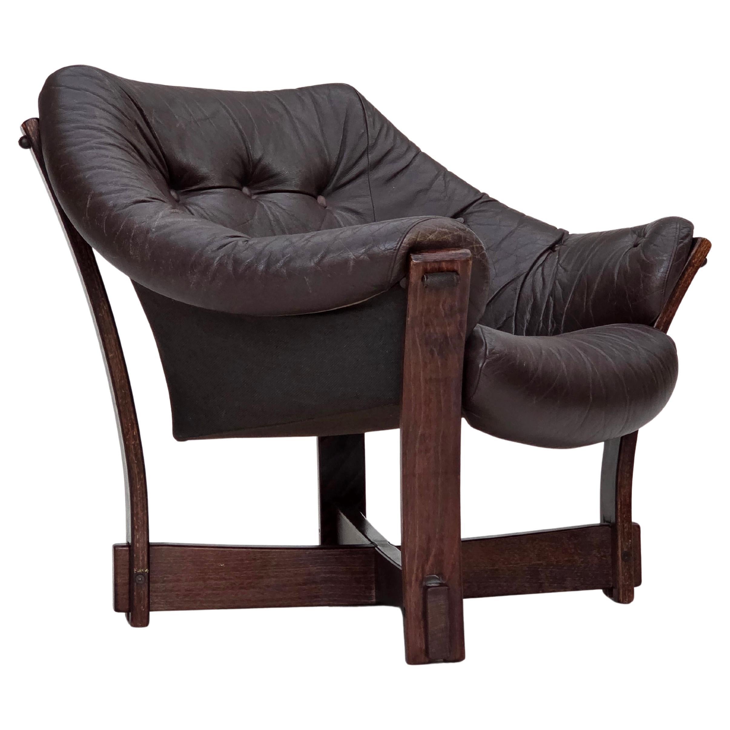 1970s, Scandinavian lounge chair, furniture leather, oak wood.