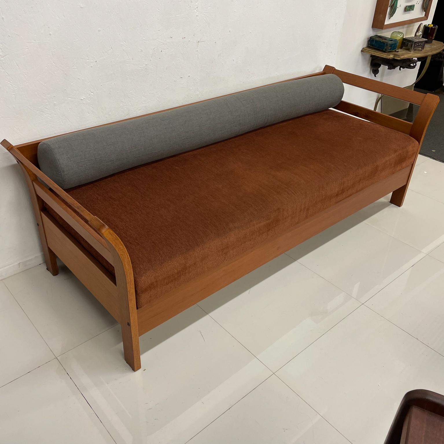 Sofa daybed.
Danish modern teak wood sofa day bed.
Fabric is burnt orange with a gray bolster pillow.
54 wide x 75 Sofa 27.25 tall x 83 wide x 31.13 diameter, seat 18 tall
Preowned original vintage condition. Refer to provided images.
LA PS OC SF