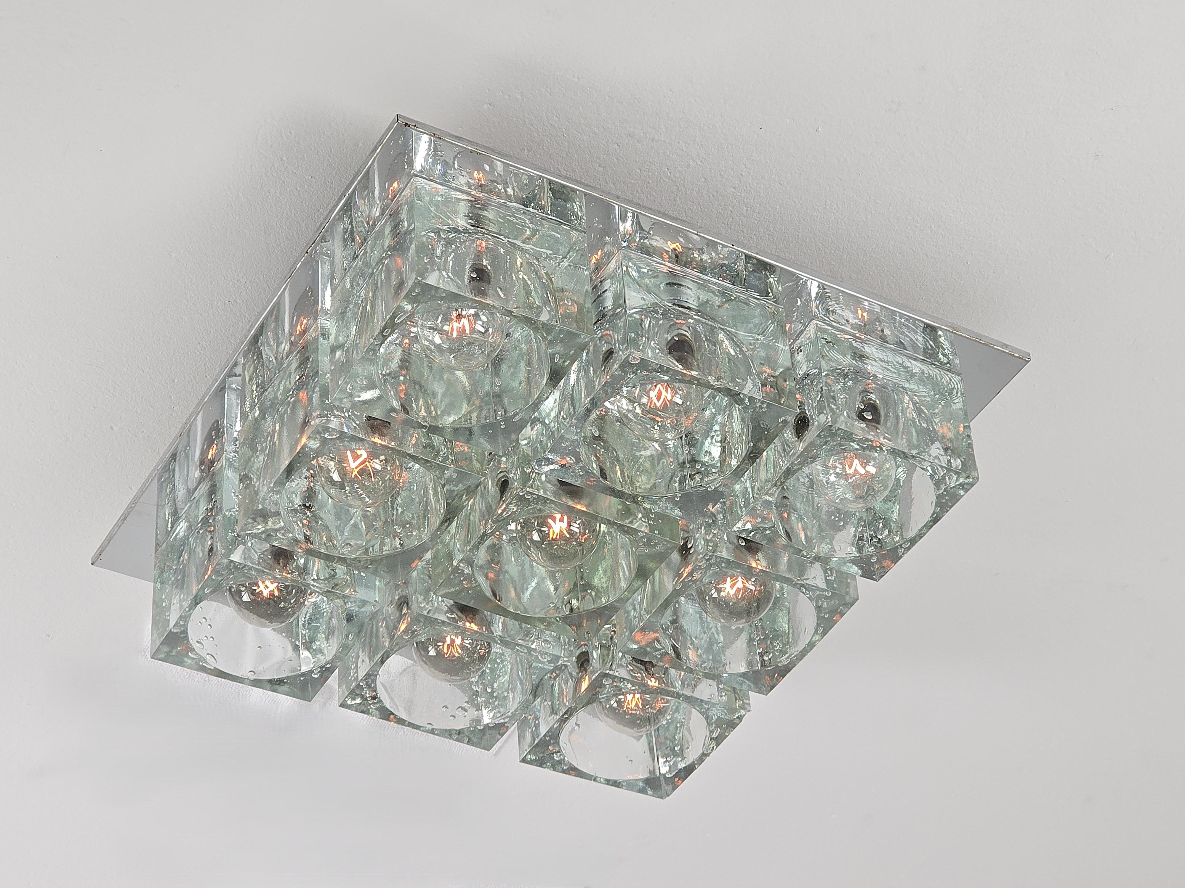 Gaetano Sciolari  massive 9 thick glass cube  chrome plated  flush mount fixture for Lightolier .  

Contain 9  E12 candelabra size socket rated at 40 watt each . 

Each cube measure 4.25 in. wide by 3 in. high . 