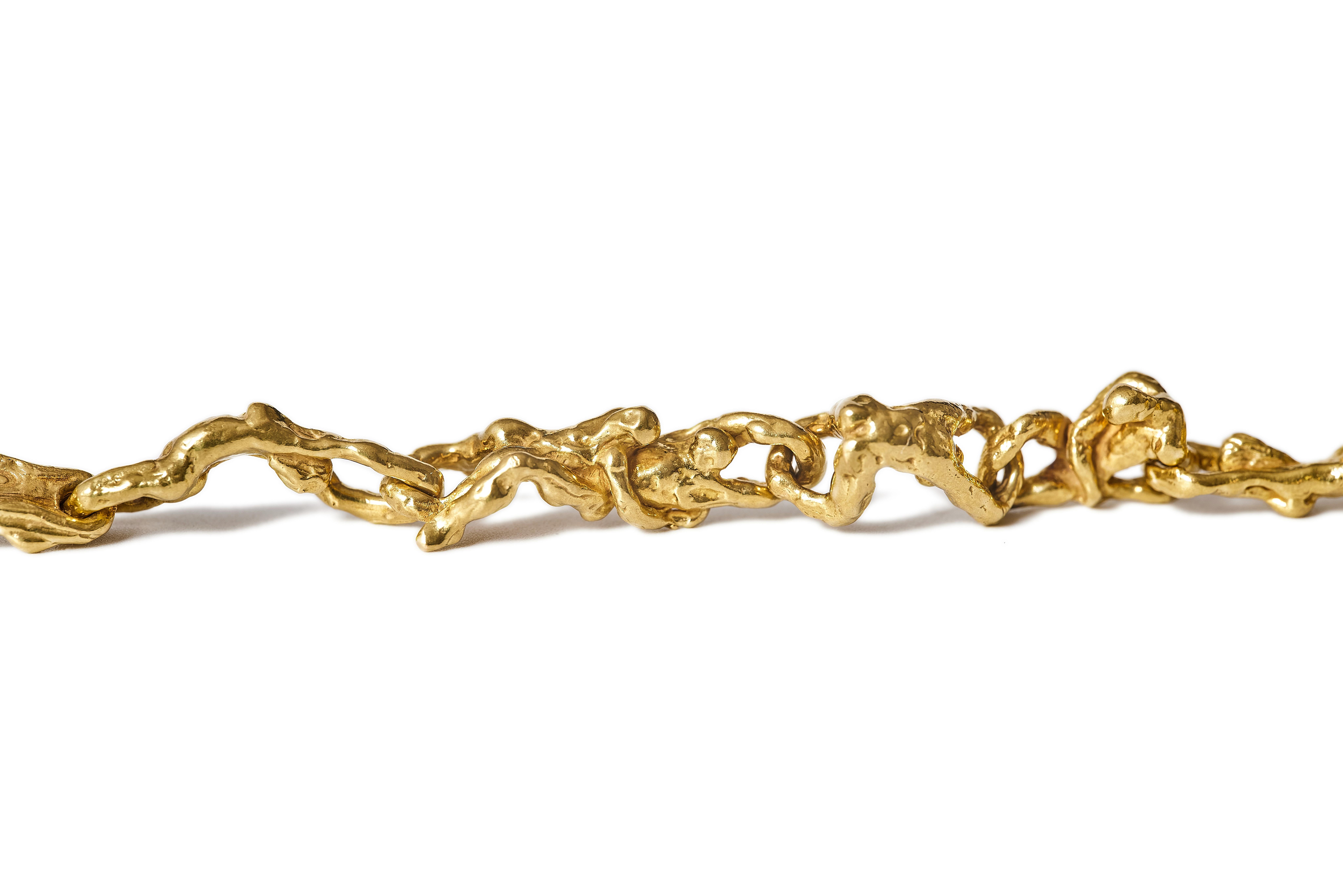 Rétro Suite di collana e bracciale scultoreo erotico in oro giallo 18 carati degli anni '70 in vendita