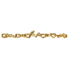 Suite di collana e bracciale scultoreo erotico in oro giallo 18 carati degli anni '70