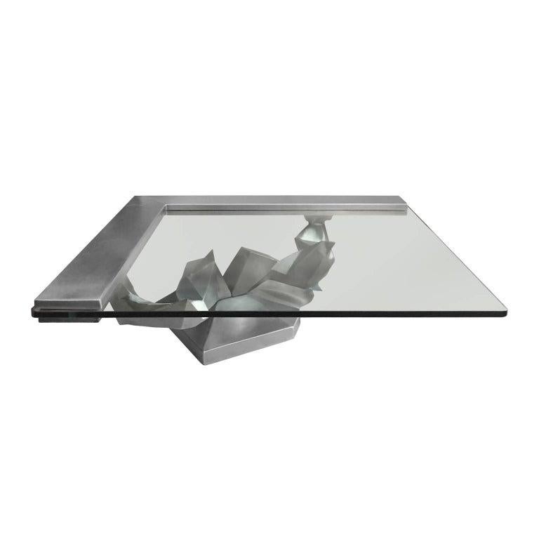Sculptural brushed stainless steel coffee table, French, 1970s.