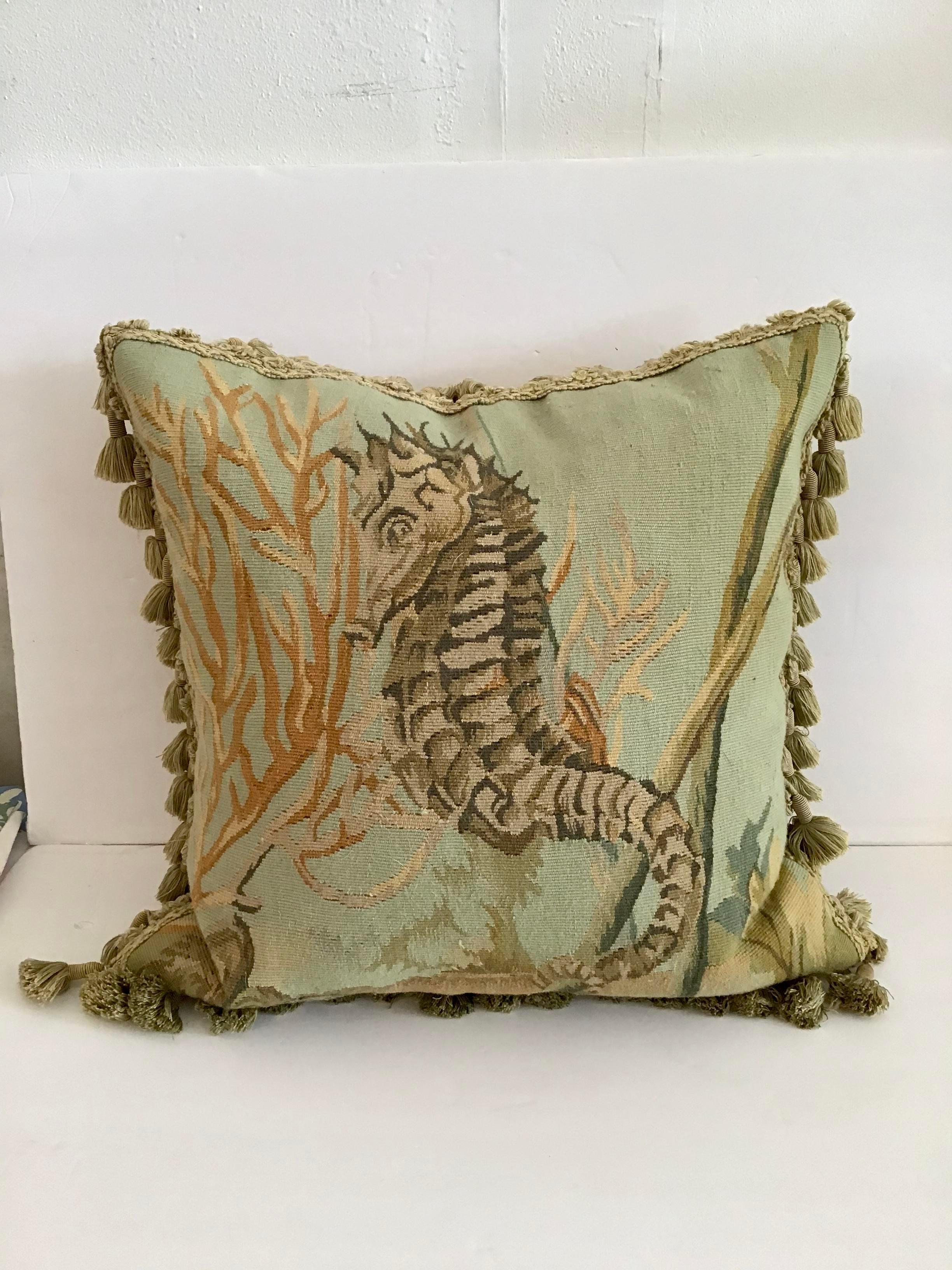 Gorgeous handwork on this Aubusson down pillow with decorative fringe. Add some chic style to your decor. Includes down pillow insert