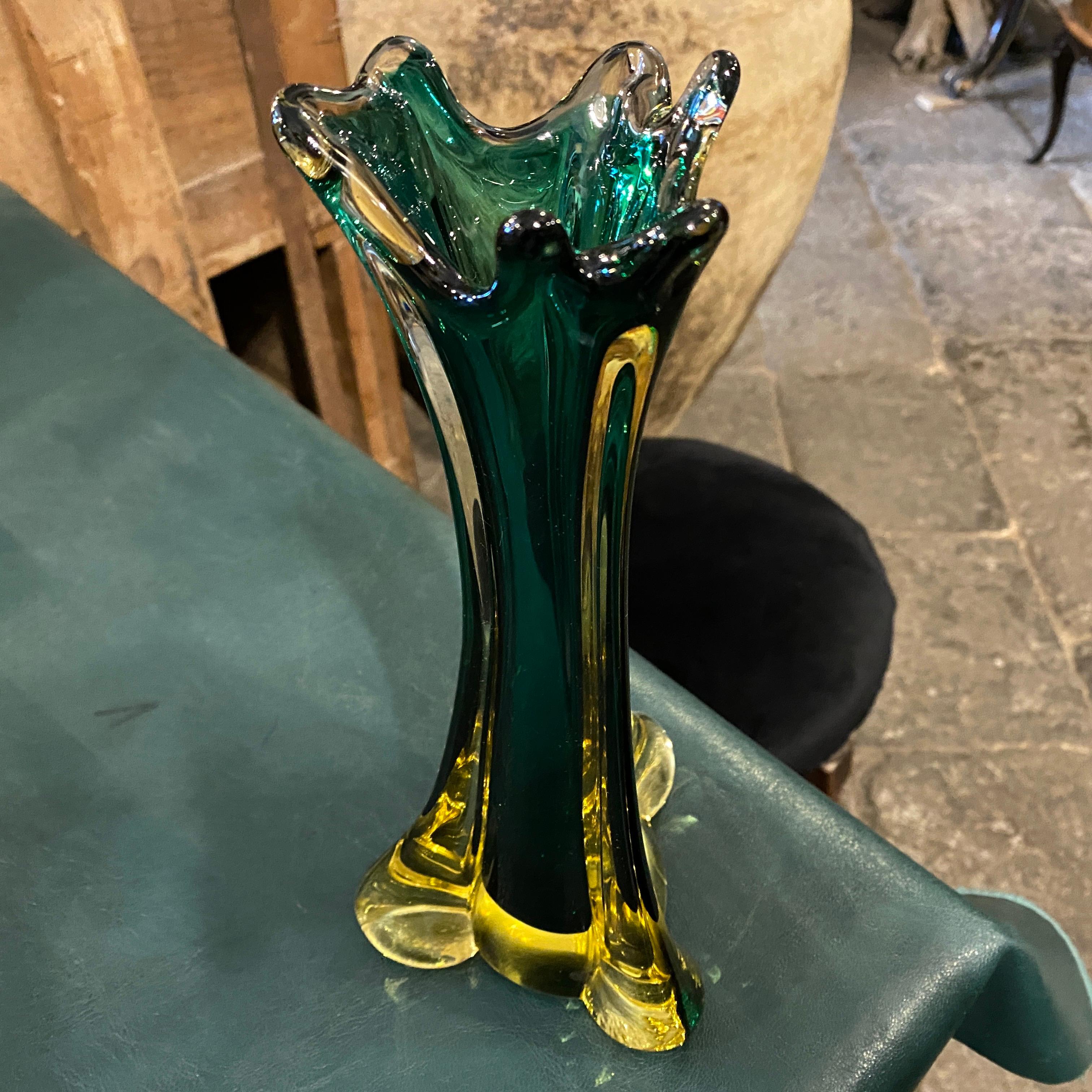 An amazing sommerso murano glass vase in perfect conditions. It has been designed and manufactured in Italy in the Seventies, the combination of yellow and green color gives it a superb vintage effect. Seguso is a renowned Murano glassmaker, the