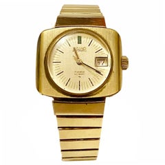 Reloj de pulsera Seiko cuadrado dorado de los años 70