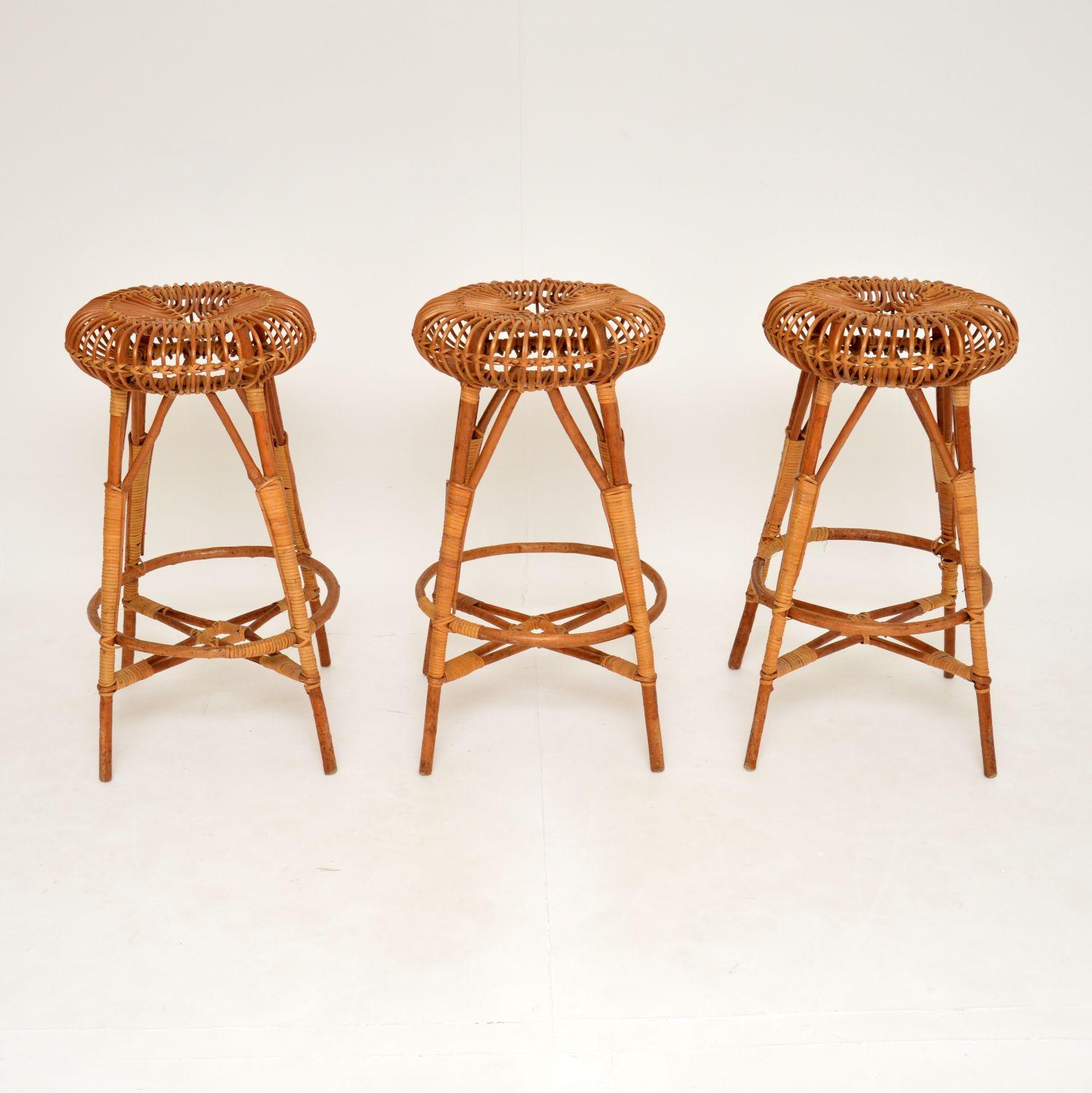 A stunning set of three bamboo bar stools, designed by Franco Albini. These are known as the lobster pot stools, they were made in Italy and date from around the 1970’s.

They are beautifully made and designed, with such a stylish look. The