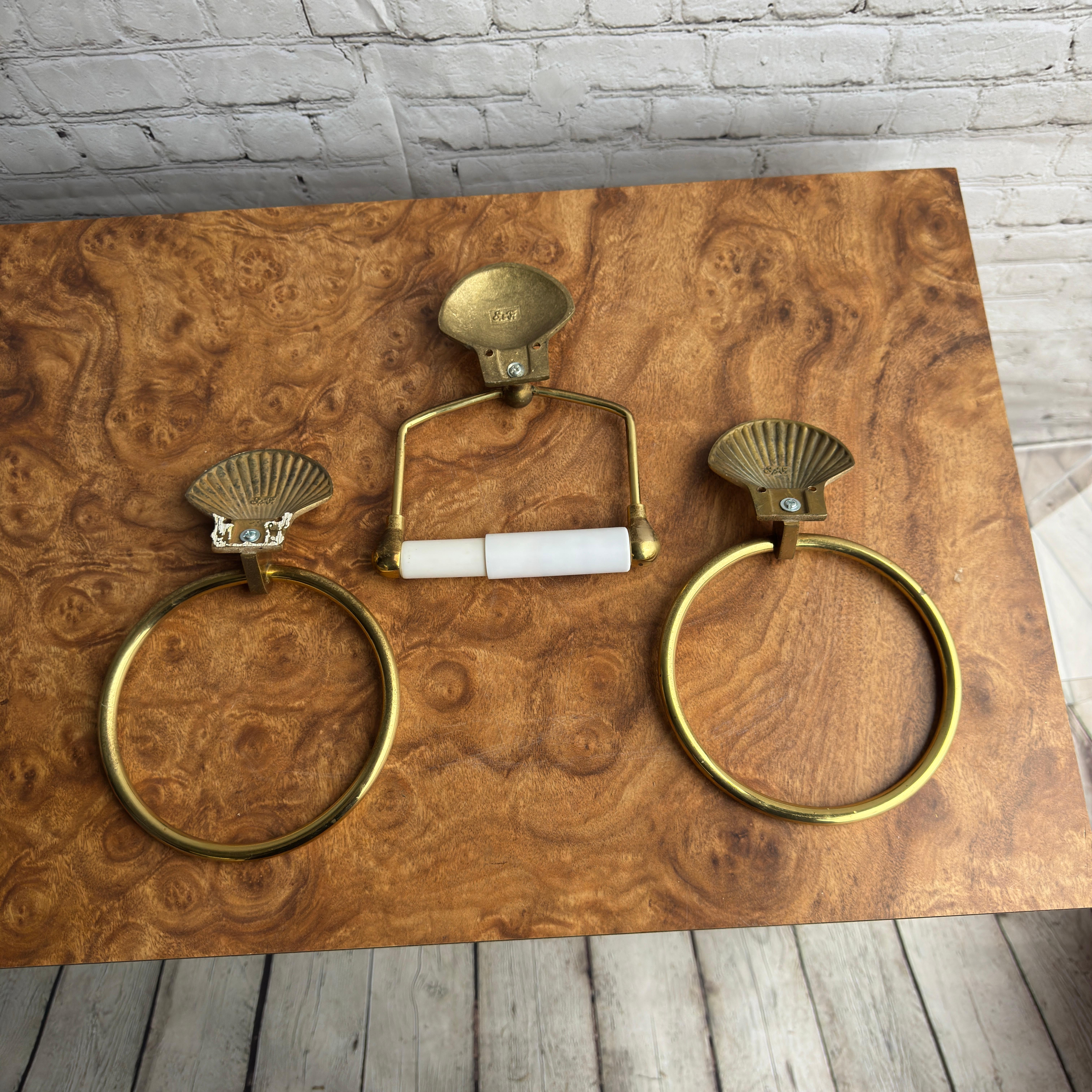 Polished 1970s Set of 3 Brass Shell Motif Towel Rings (Pair) and Toilet Paper Roll Holder For Sale