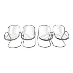 1970s Set of 4 Chromed Steel Cantilever Dining Chairs by Gastone Rinaldi