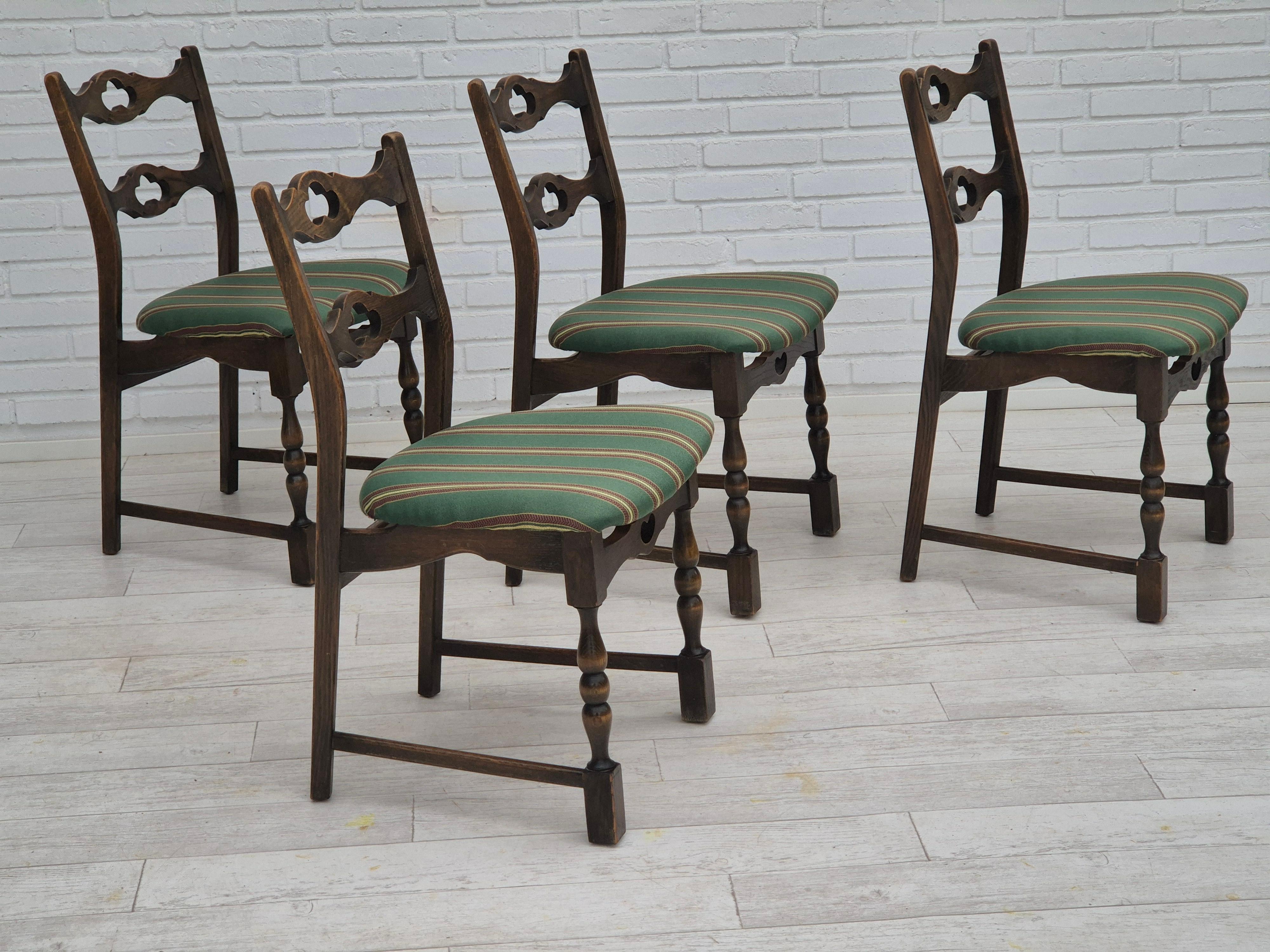 1970s, set of 4 Danish dining chairs in original very good condition: no smells and no stains. Dark oak wood, green/multicolour furniture wool fabric. Manufactured by Danish furniture maker in about 1970s.