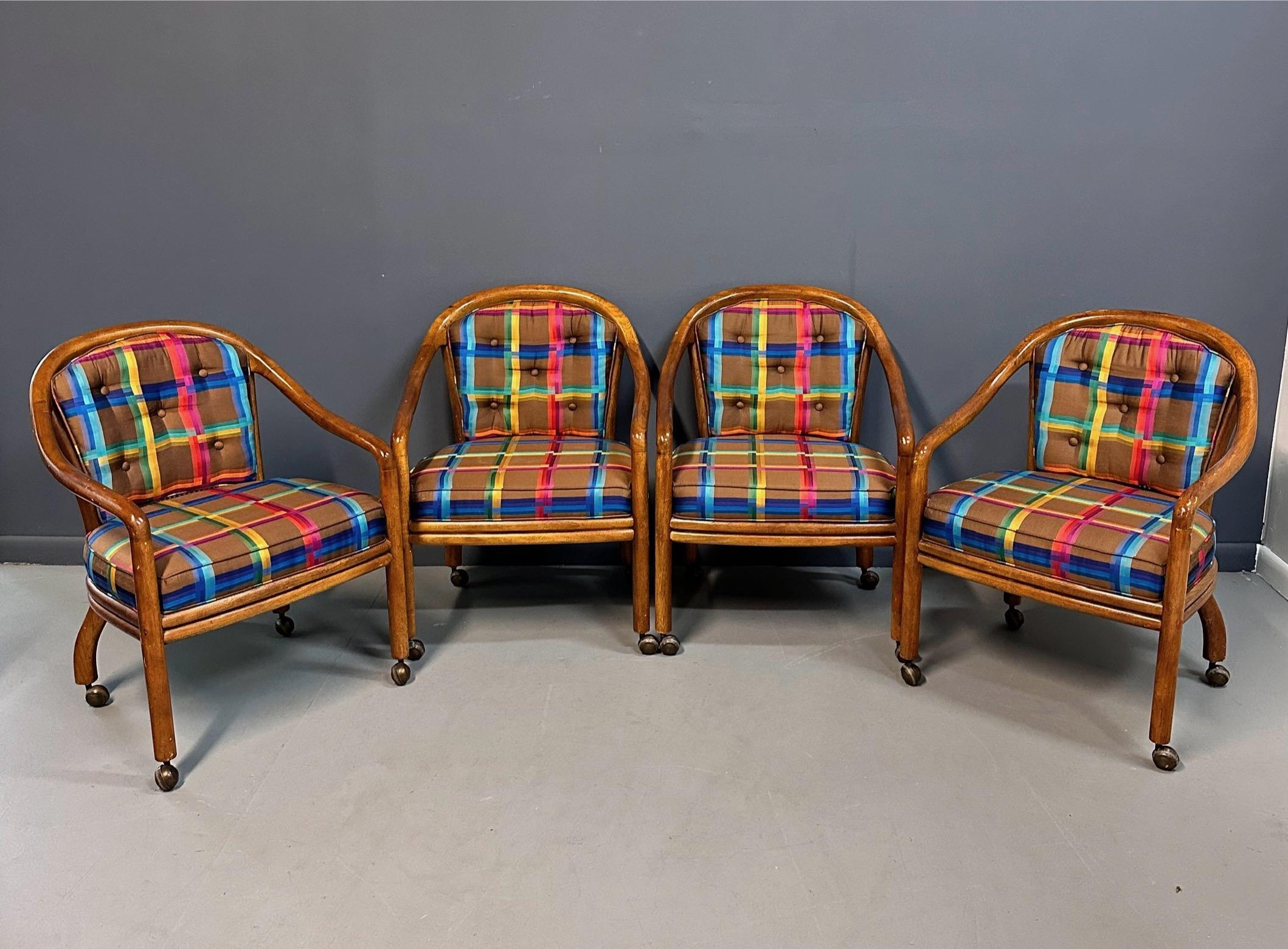 Transform your game room with this set of 4 Drexel game table chairs from the 1970s. With elegant cane backs and a mid-century design, these chairs have been upholstered in a stunning plaid fabric that is in wonderful condition. Perfect for game