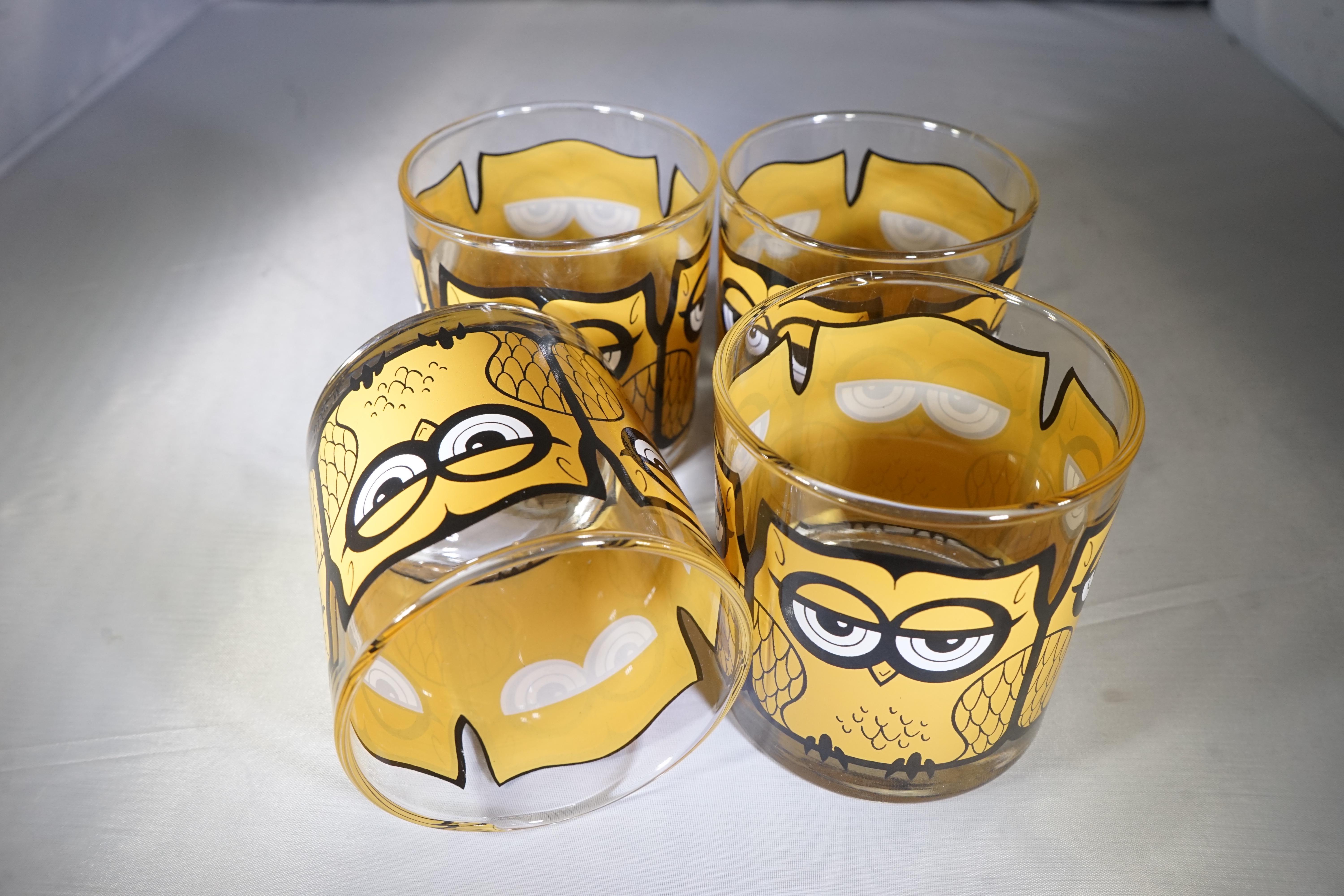 1970s set of 4 low glass tumblers featuring orange and black owl designs by M. Petti.