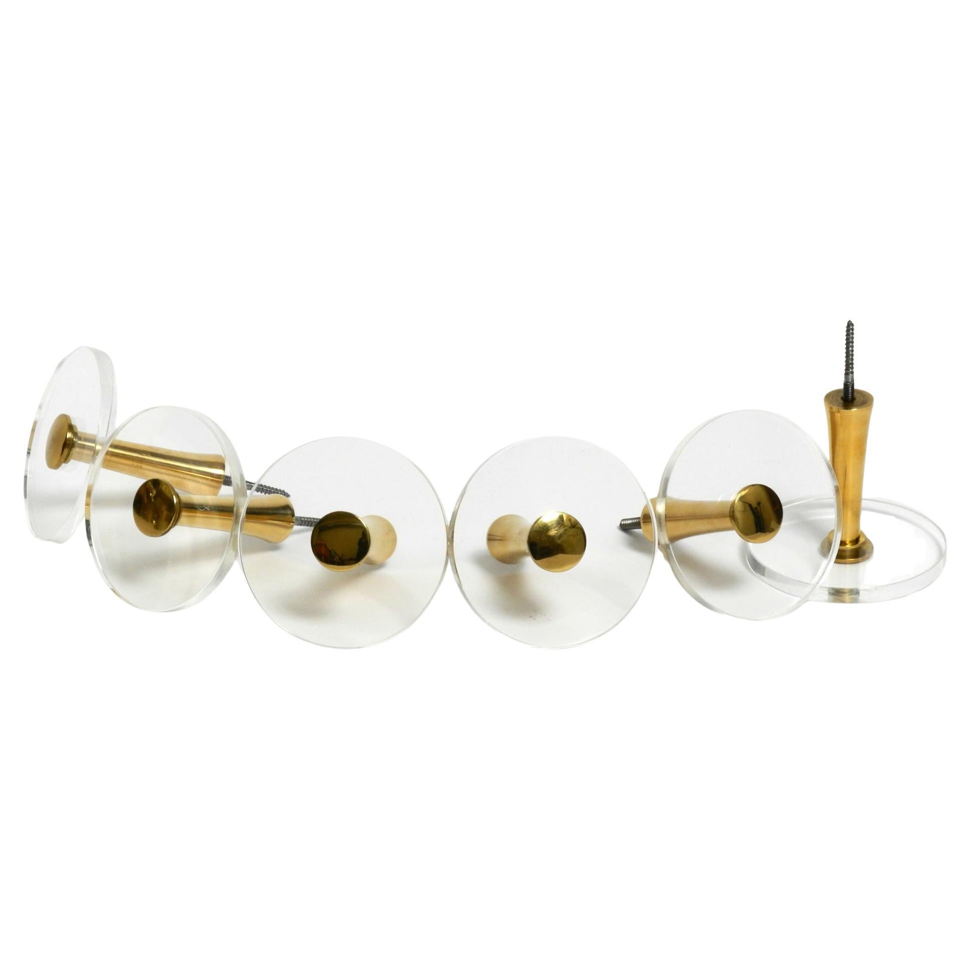 1970s set of 6 coat hooks made of brass and plexiglass by Vereinigte Werkstätten For Sale