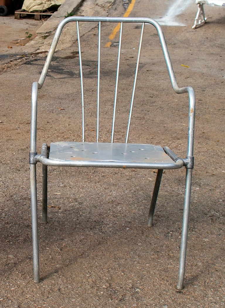 1970s set of eight Spanish iron garden chairs in steel finish.