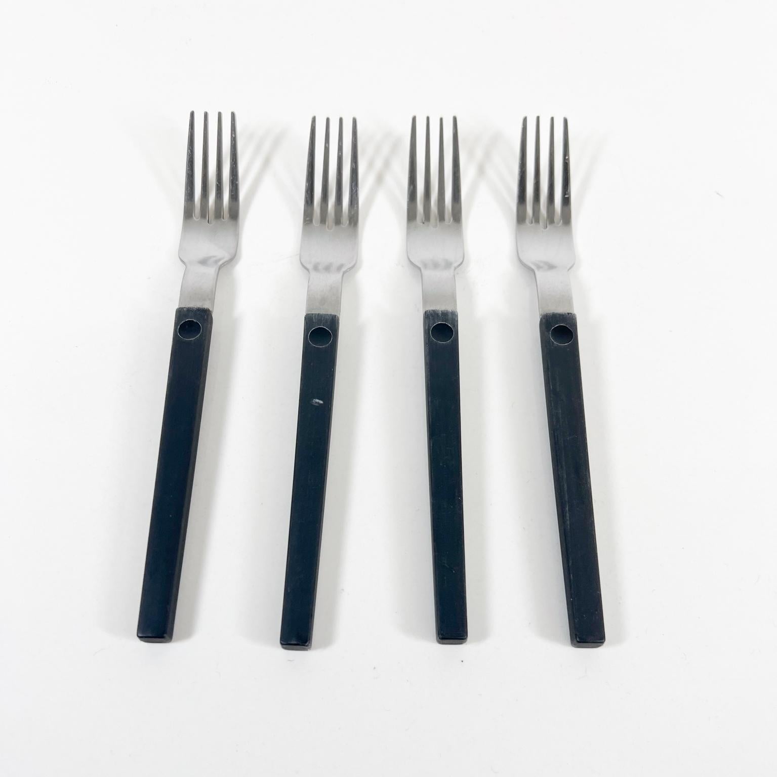 1970s Set of Four Black Forks + One Spoon MCM Flatware
In the Style of Raymond Loewy
Fork .75 x 7.88 x .5 h (4)
Spoon 1.5 x 7.5 x .5 h (1)
Unrestored preowned vintage condition
See all images.