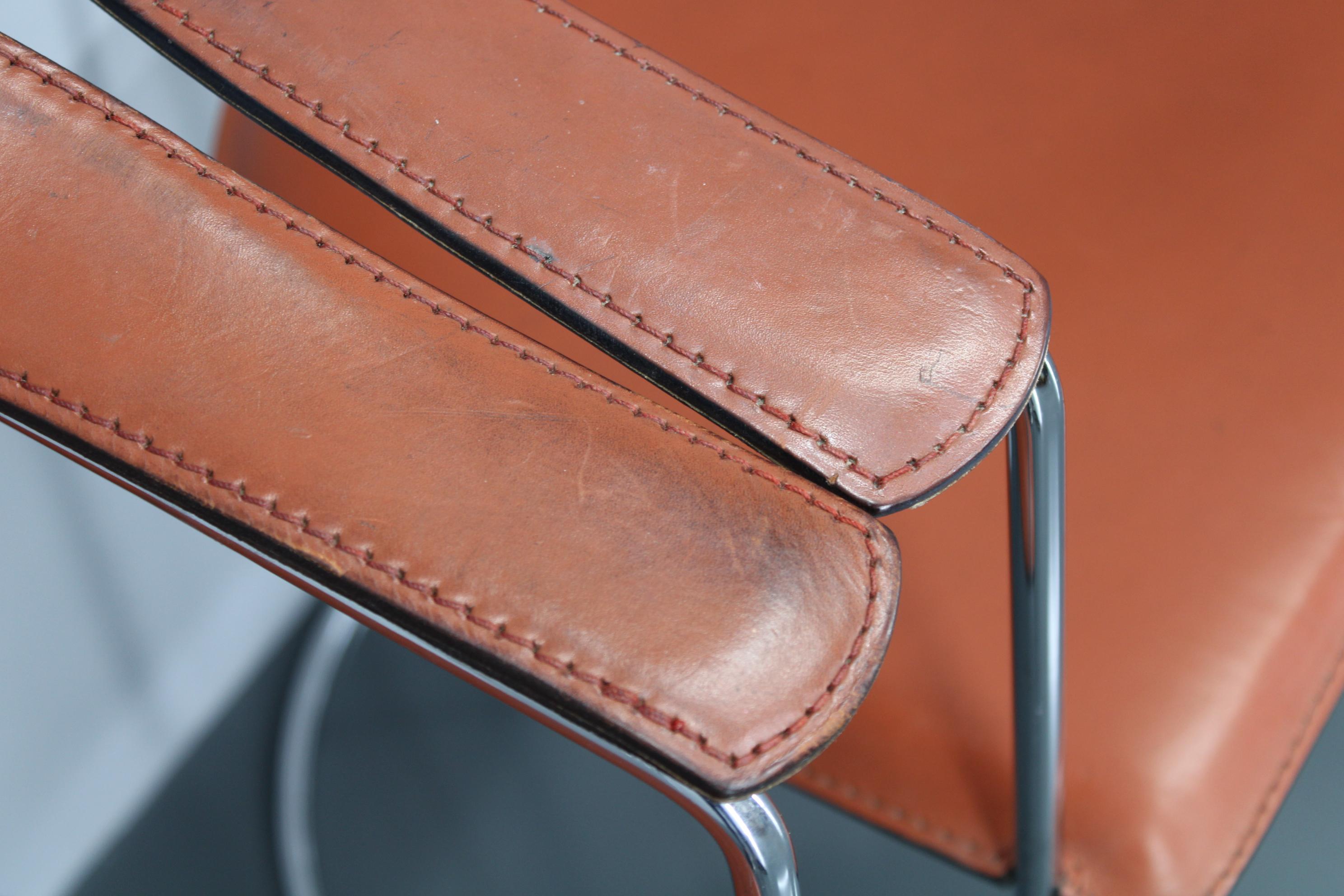 Set di quattro poltrone in pelle 