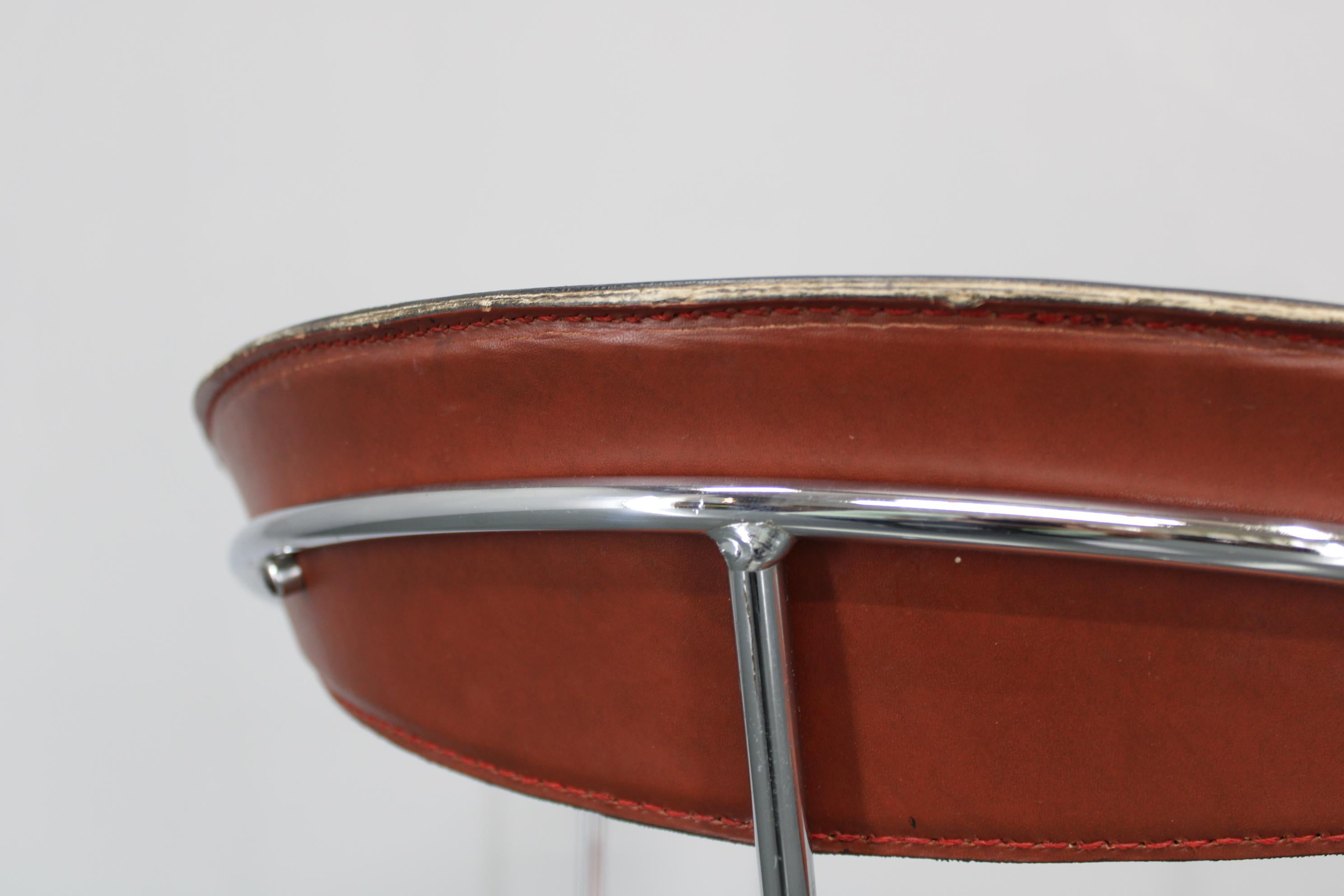 Set di quattro poltrone in pelle 
